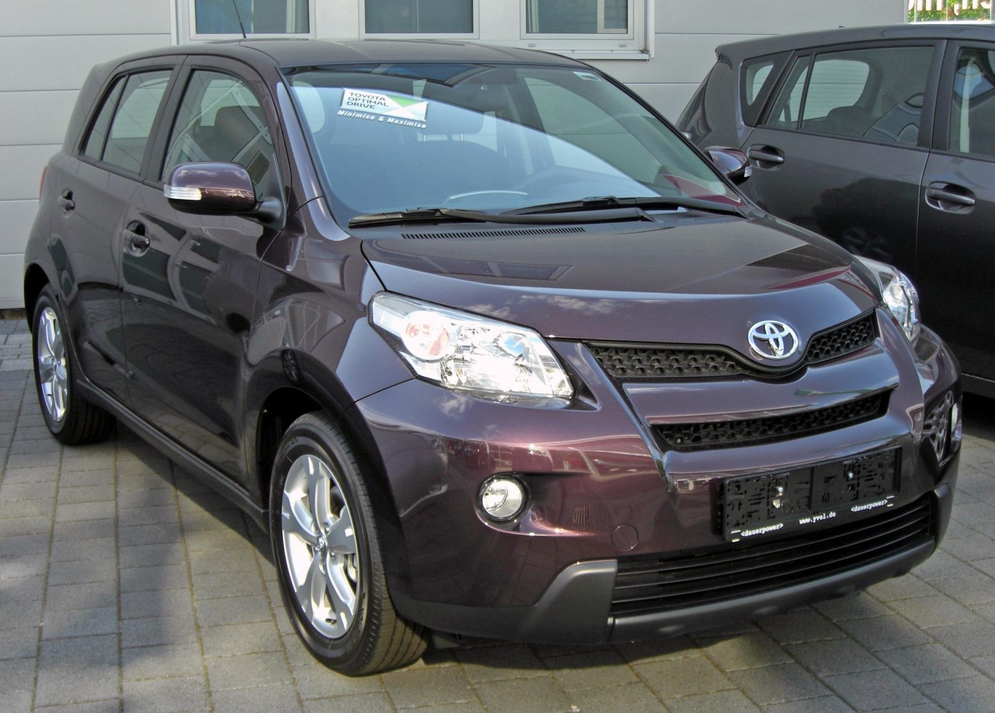 Compact urban SUV front view with headlights and grille