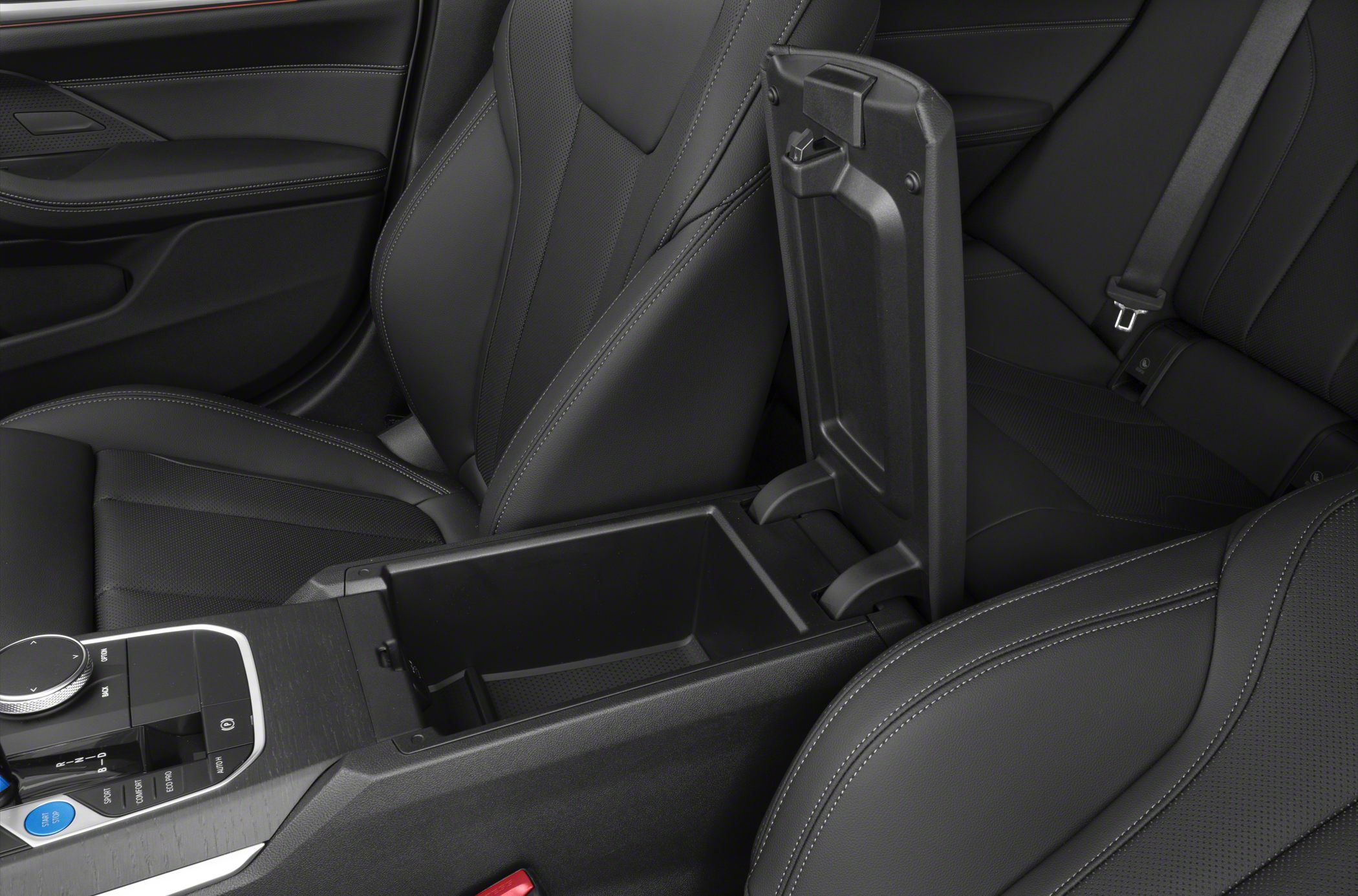 Black leather seats and open center console storage compartment