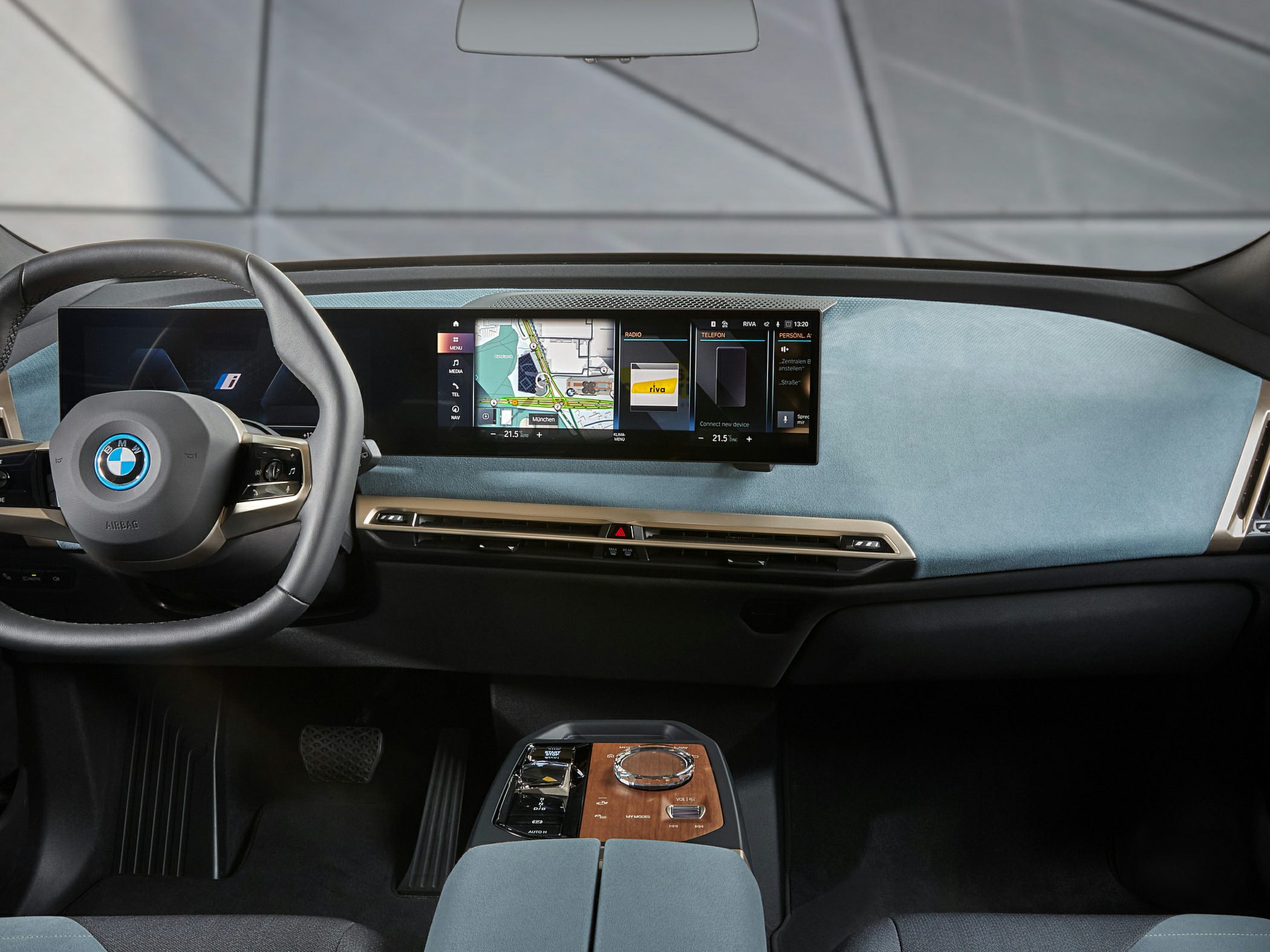 Wide digital dashboard and modern steering wheel with integrated controls