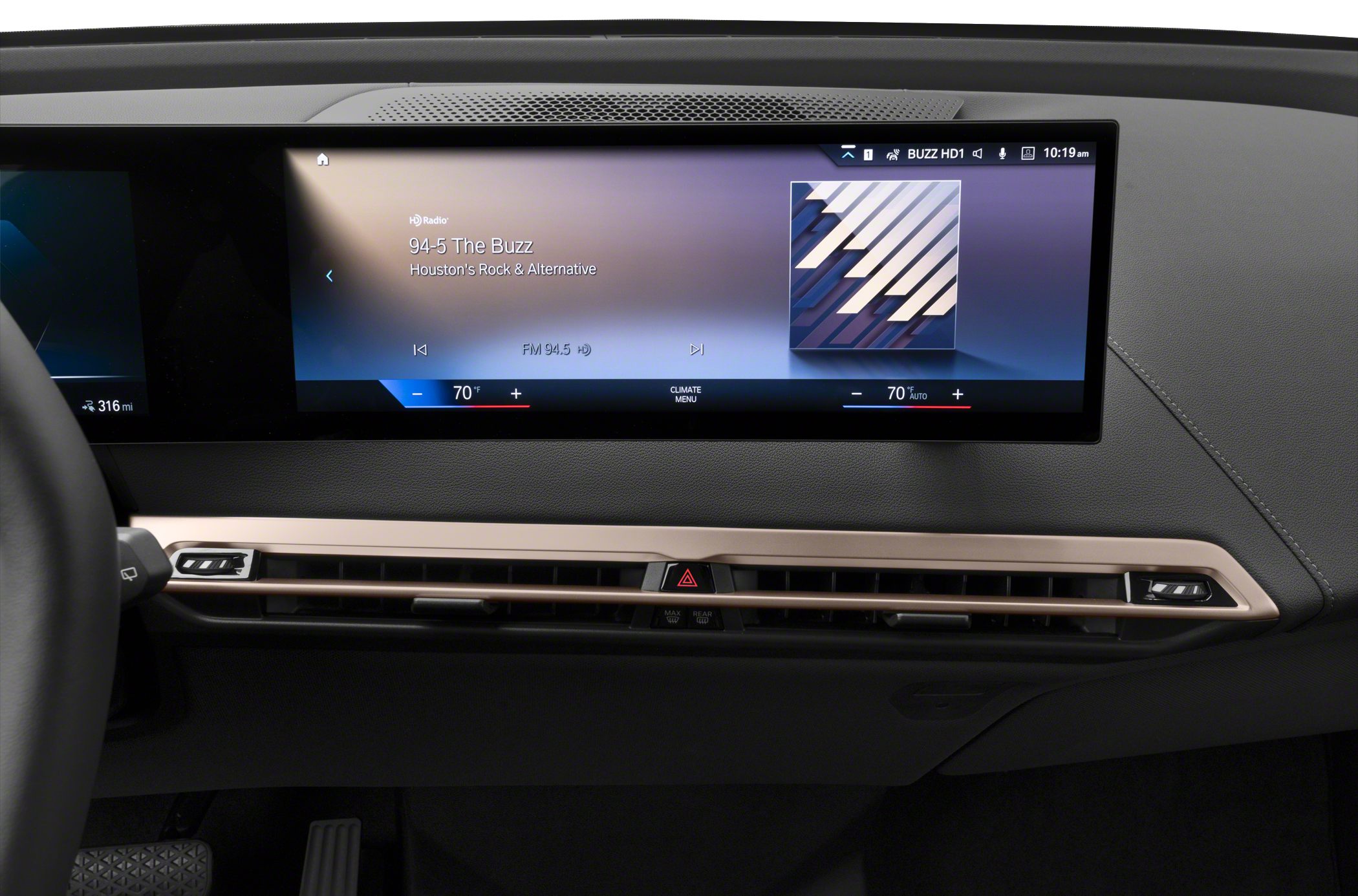 Wide digital dashboard display with climate control and media interface