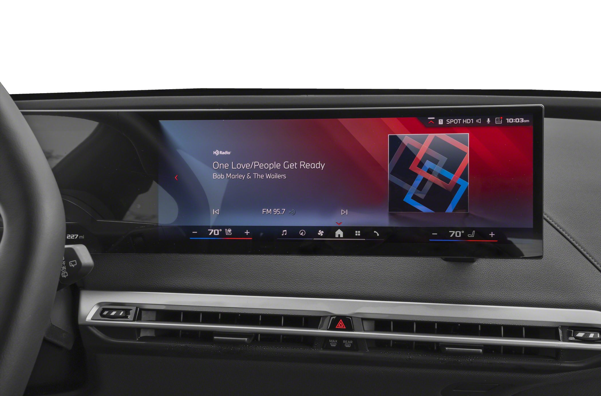 Wide digital dashboard screen showing radio and climate control settings