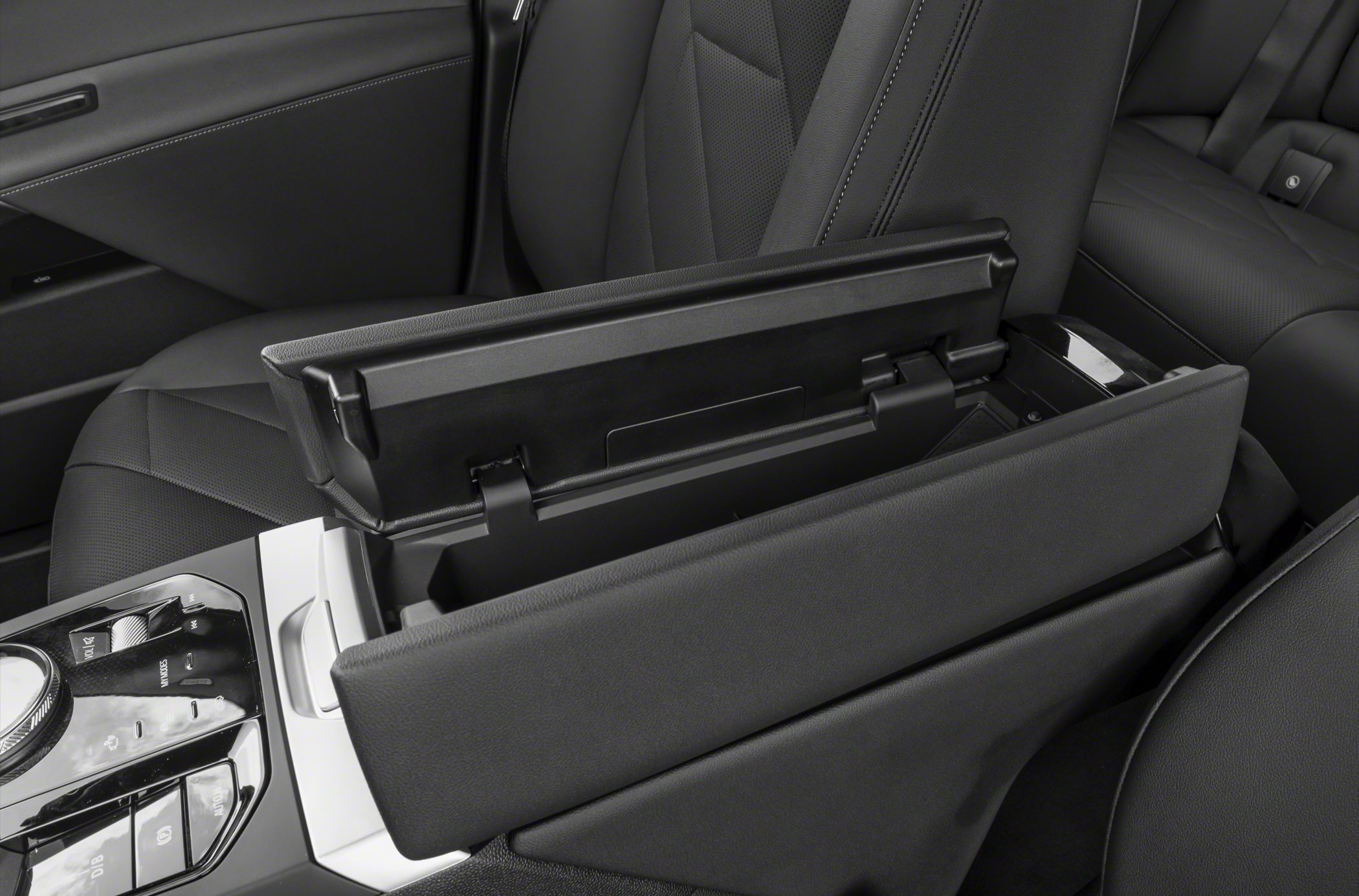Open center console storage and armrest in vehicle interior