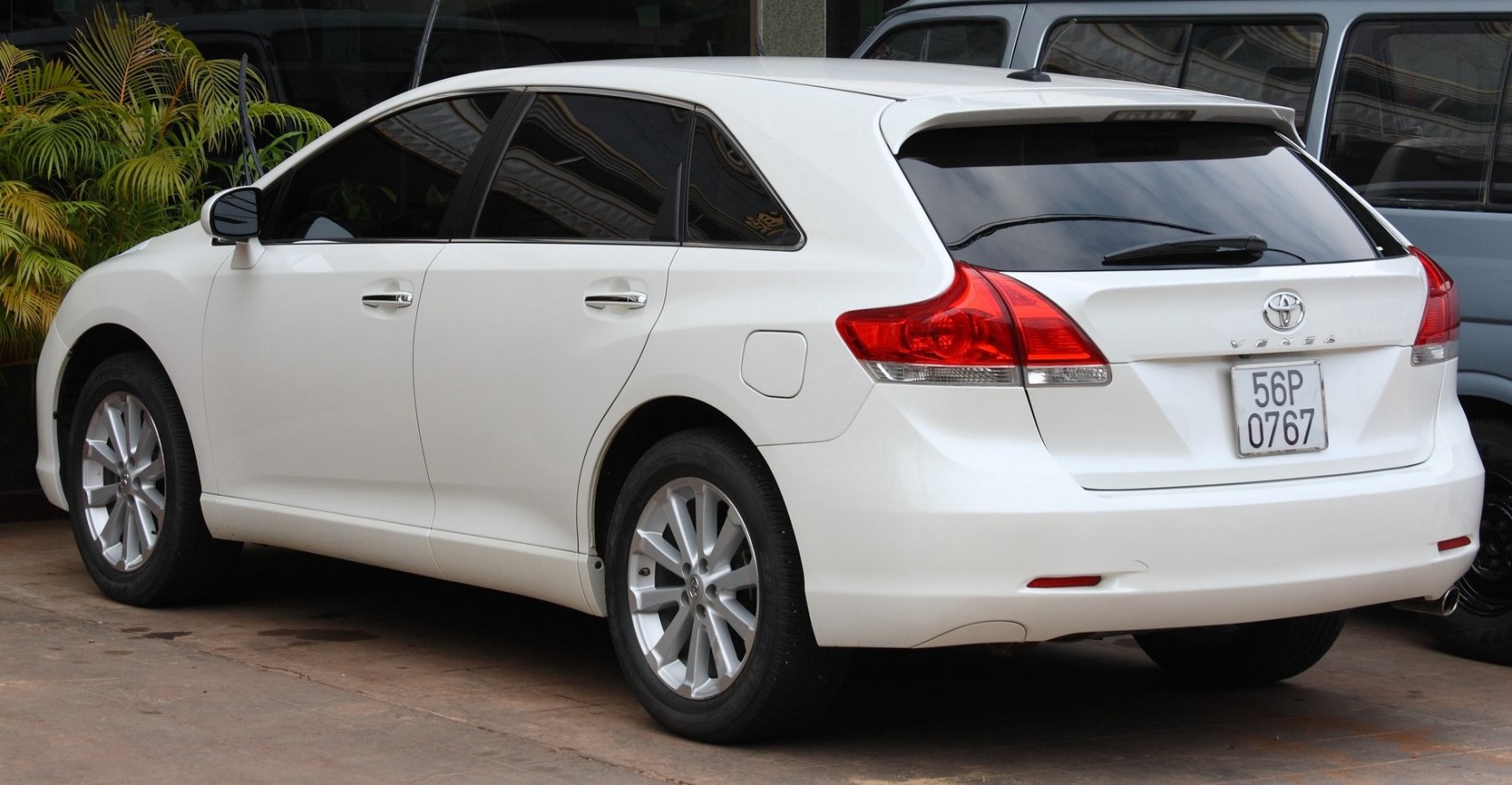 Rear and side view with taillights and alloy wheels