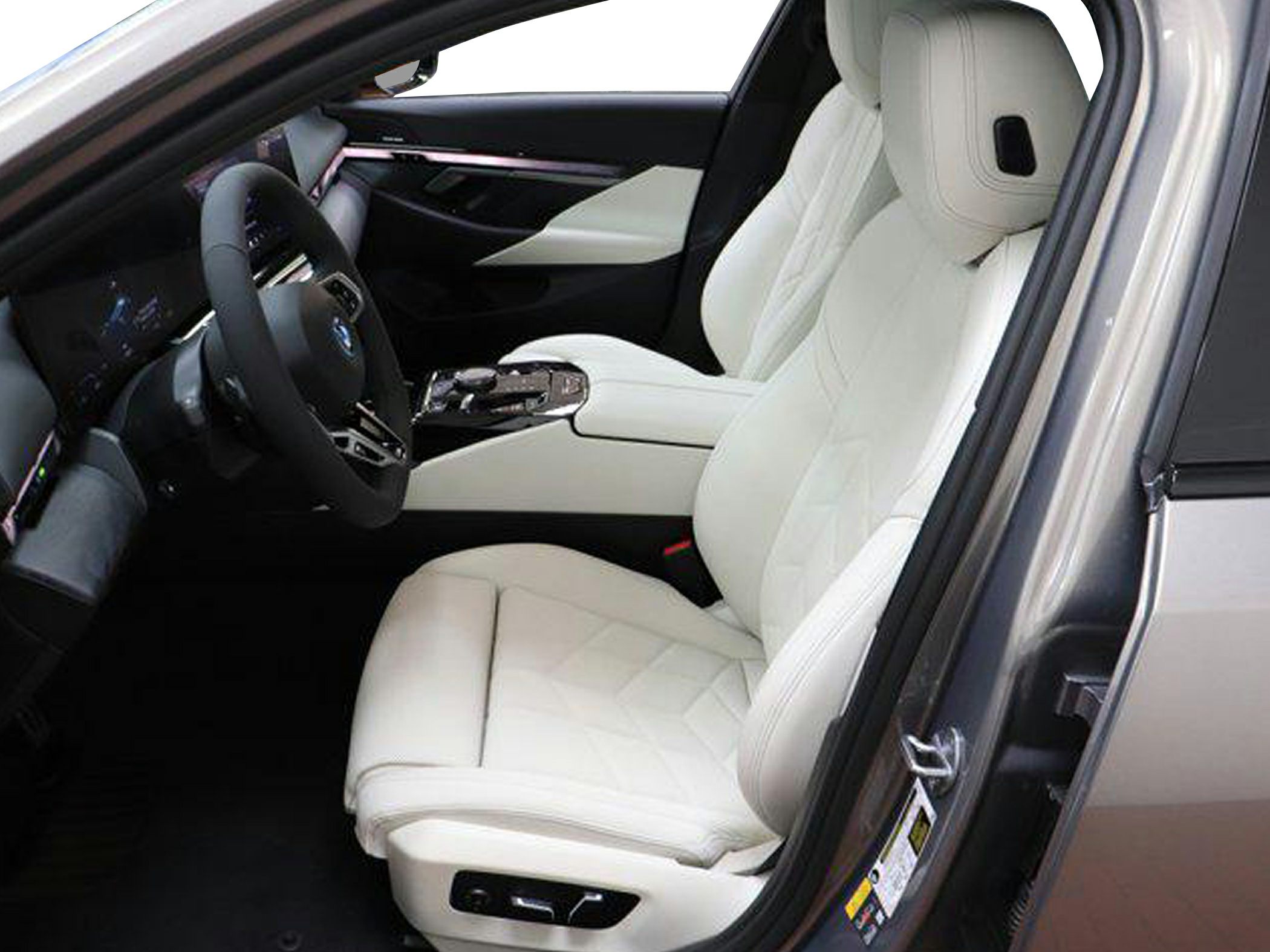 White leather seats and modern digital dashboard