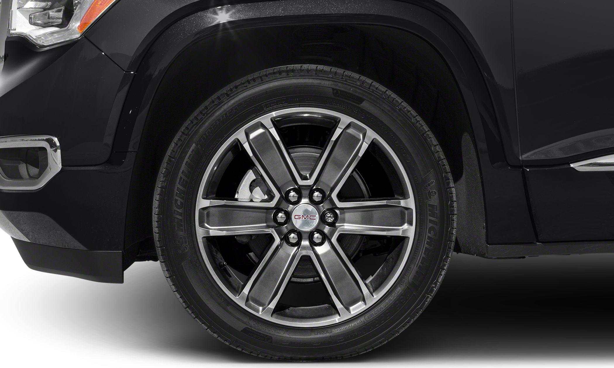 Close-up of alloy wheel and tire on SUV.