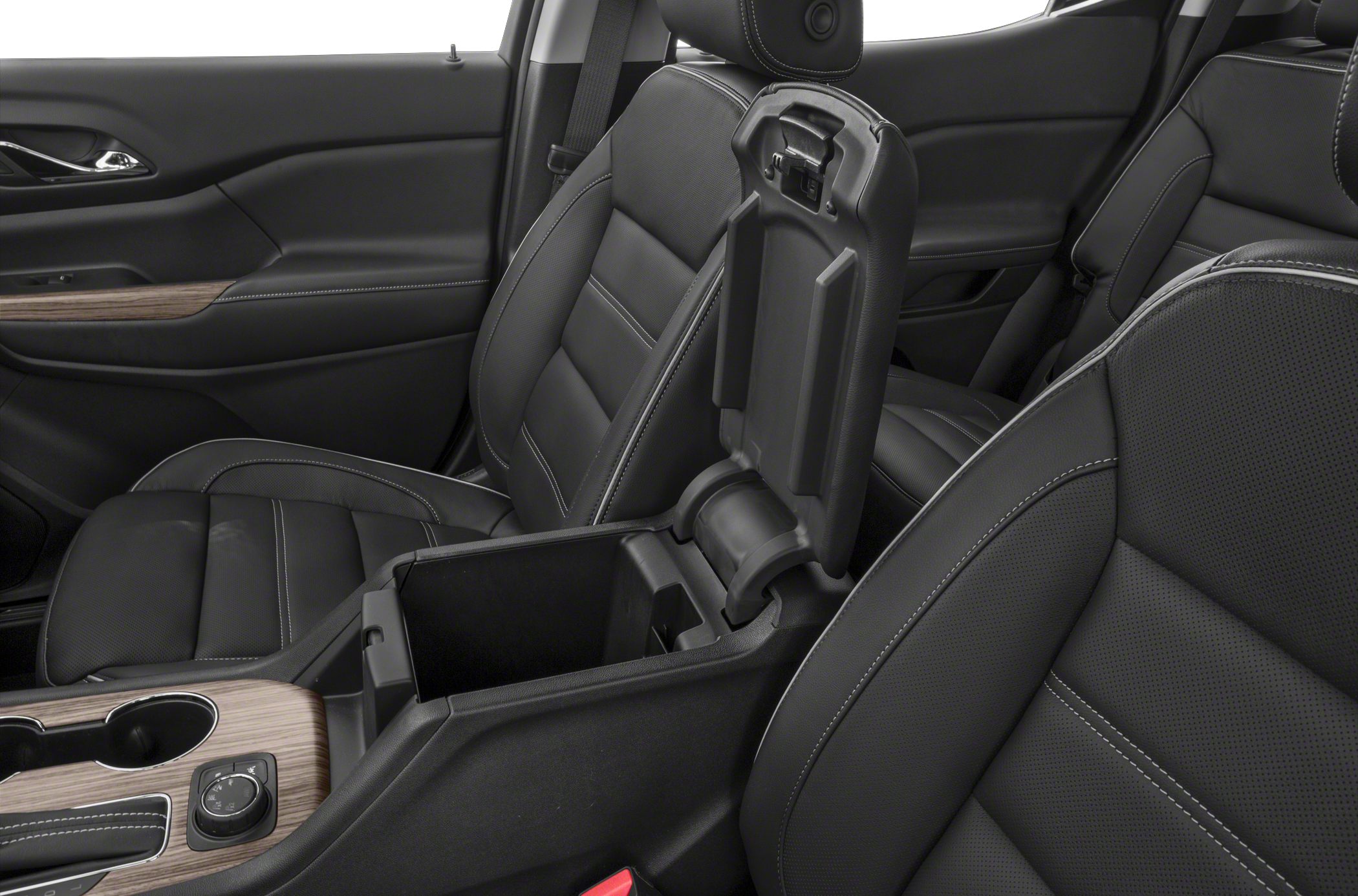 Leather seats and open center console with wood trim and storage compartment