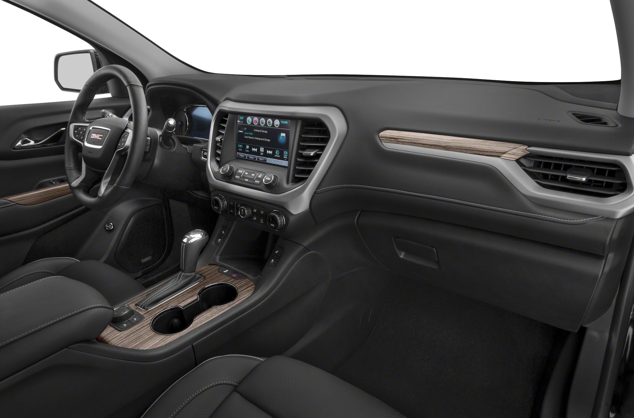 Dashboard with touchscreen infotainment and wood-trimmed center console.