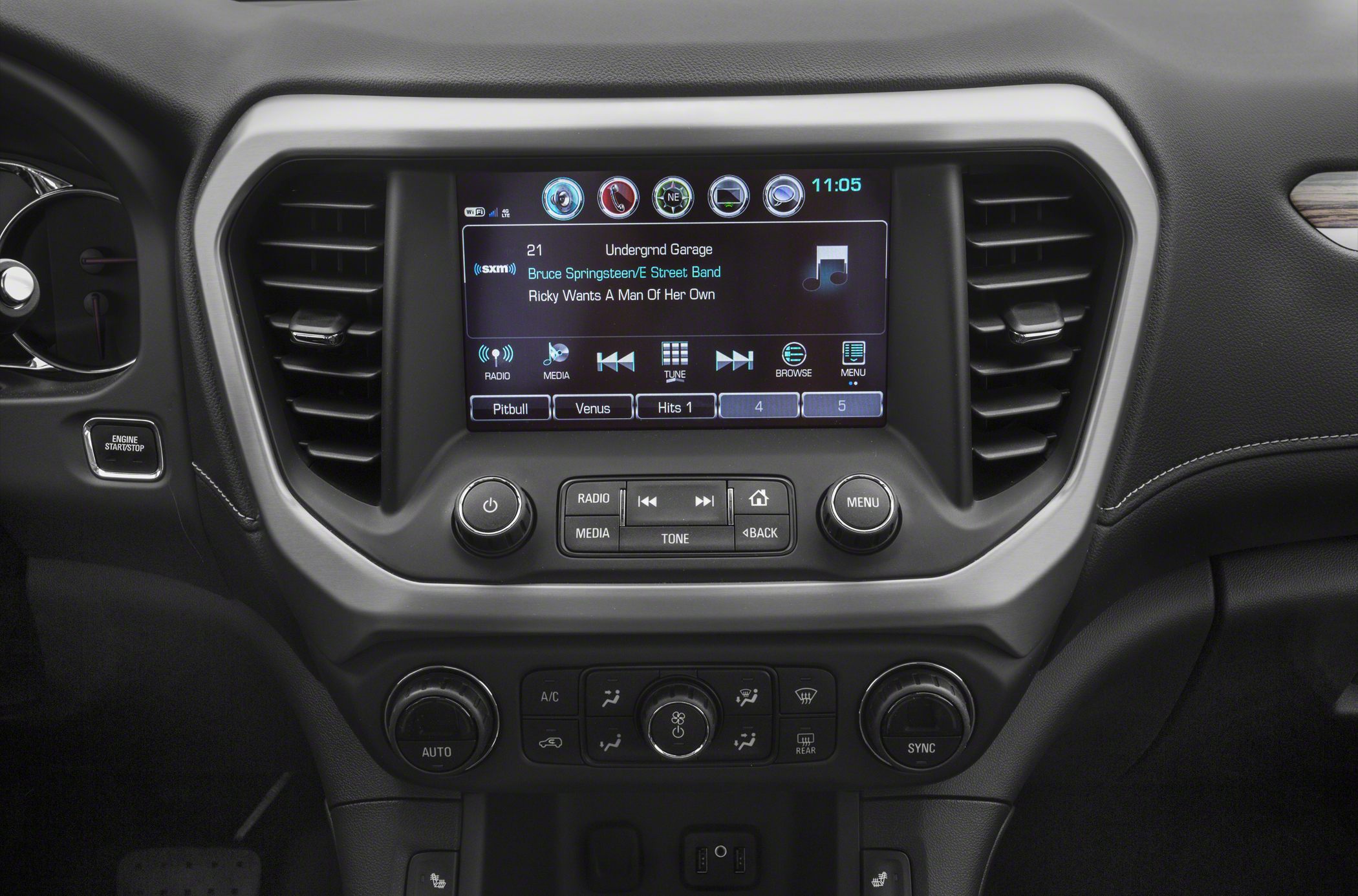 Central infotainment touchscreen with climate controls and air vents