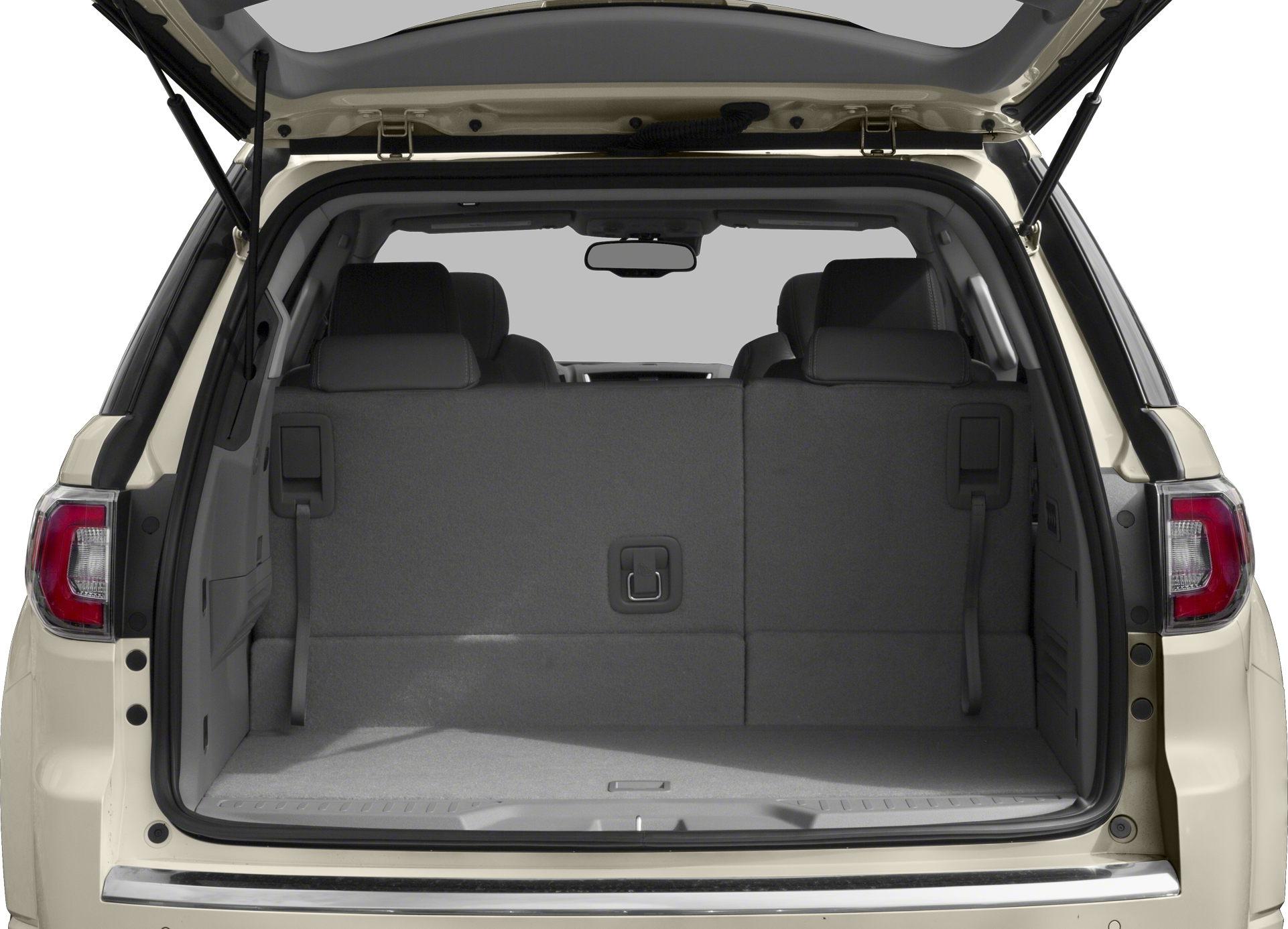 Open rear cargo space with seats upright in SUV
