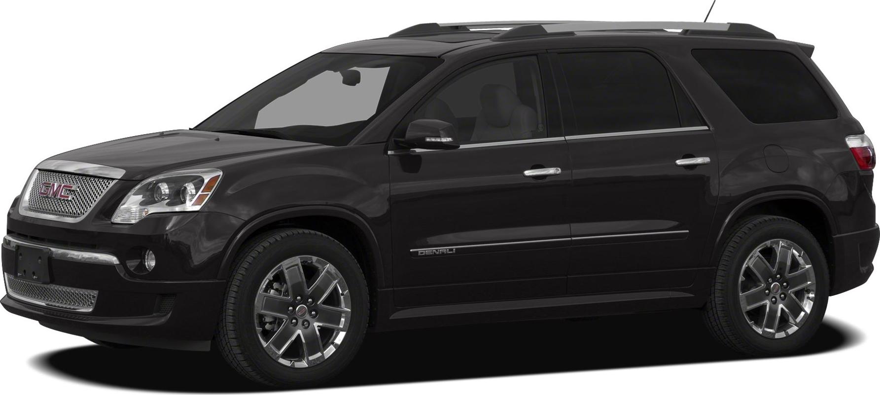 Black SUV with chrome grille and alloy wheels, side view