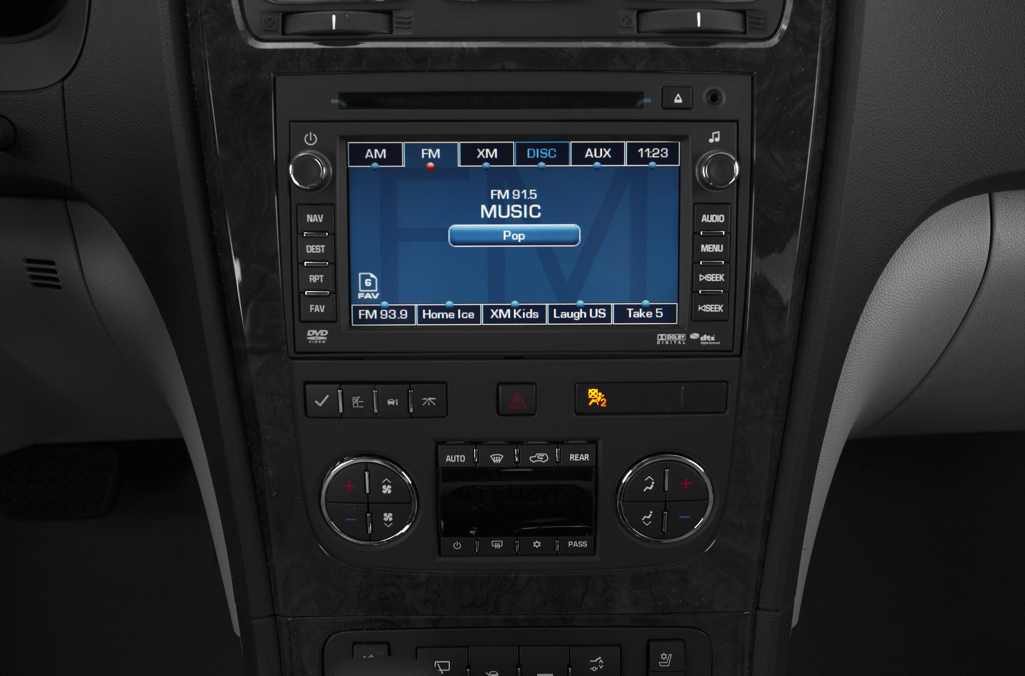 Touchscreen infotainment system with radio and dual-zone climate control knobs