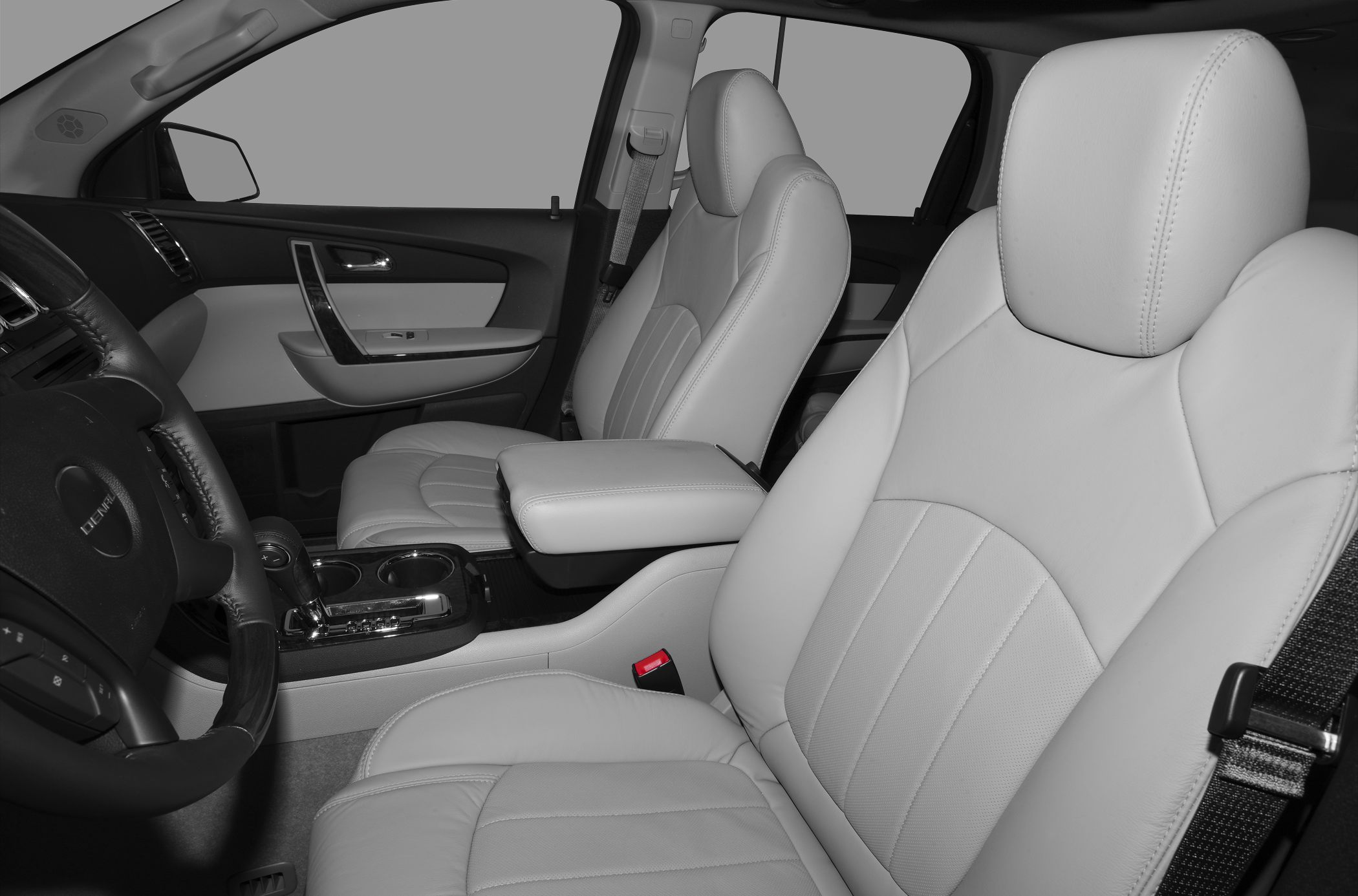 Front leather seats and center console with armrest and cup holders