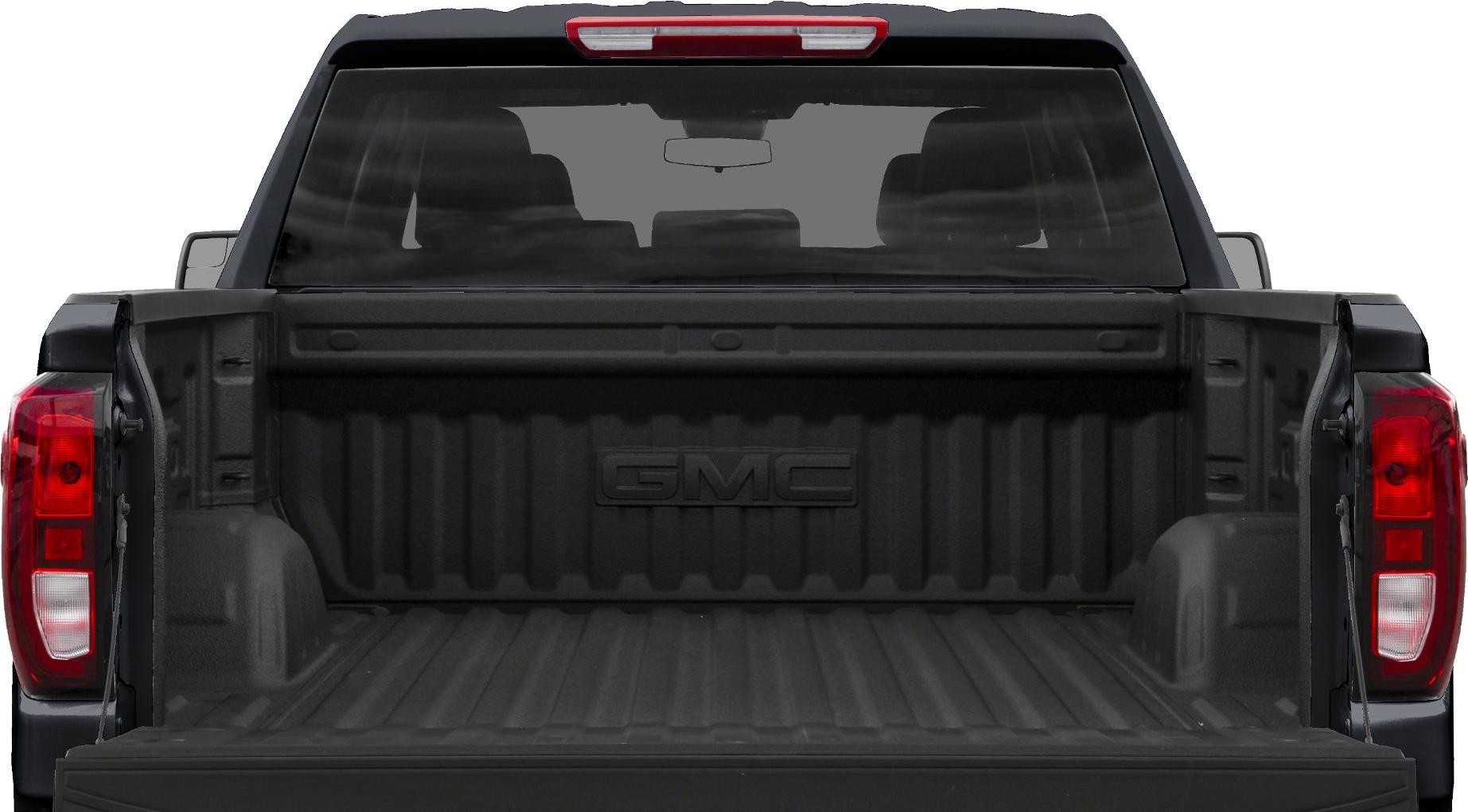 Open truck bed with tailgate down, rear view of pickup