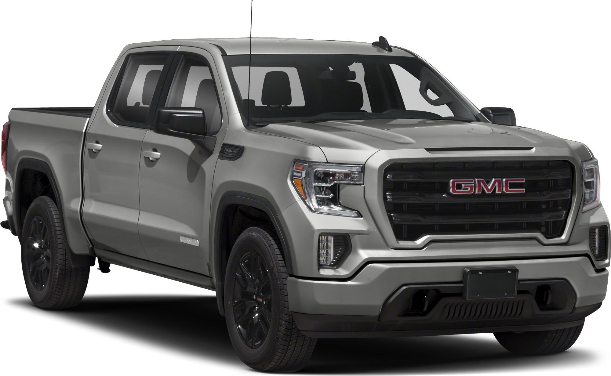 Front-side view of a metallic gray pickup with black wheels and rectangular grille.