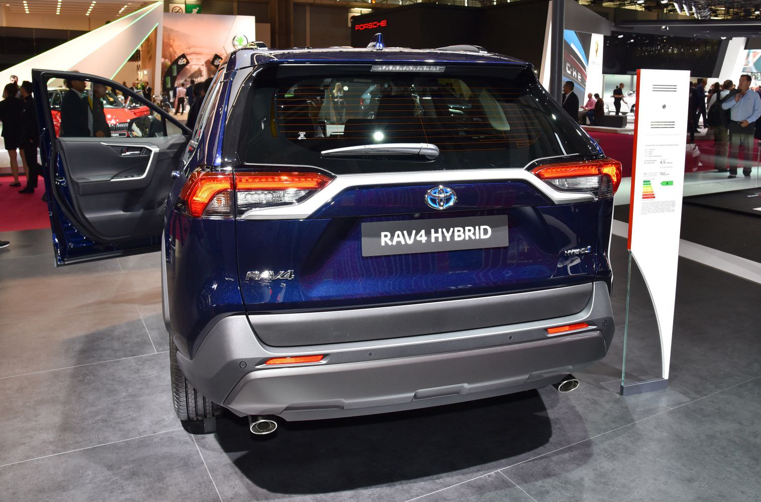 Rear view highlighting taillights, rear windshield, and exhaust pipe