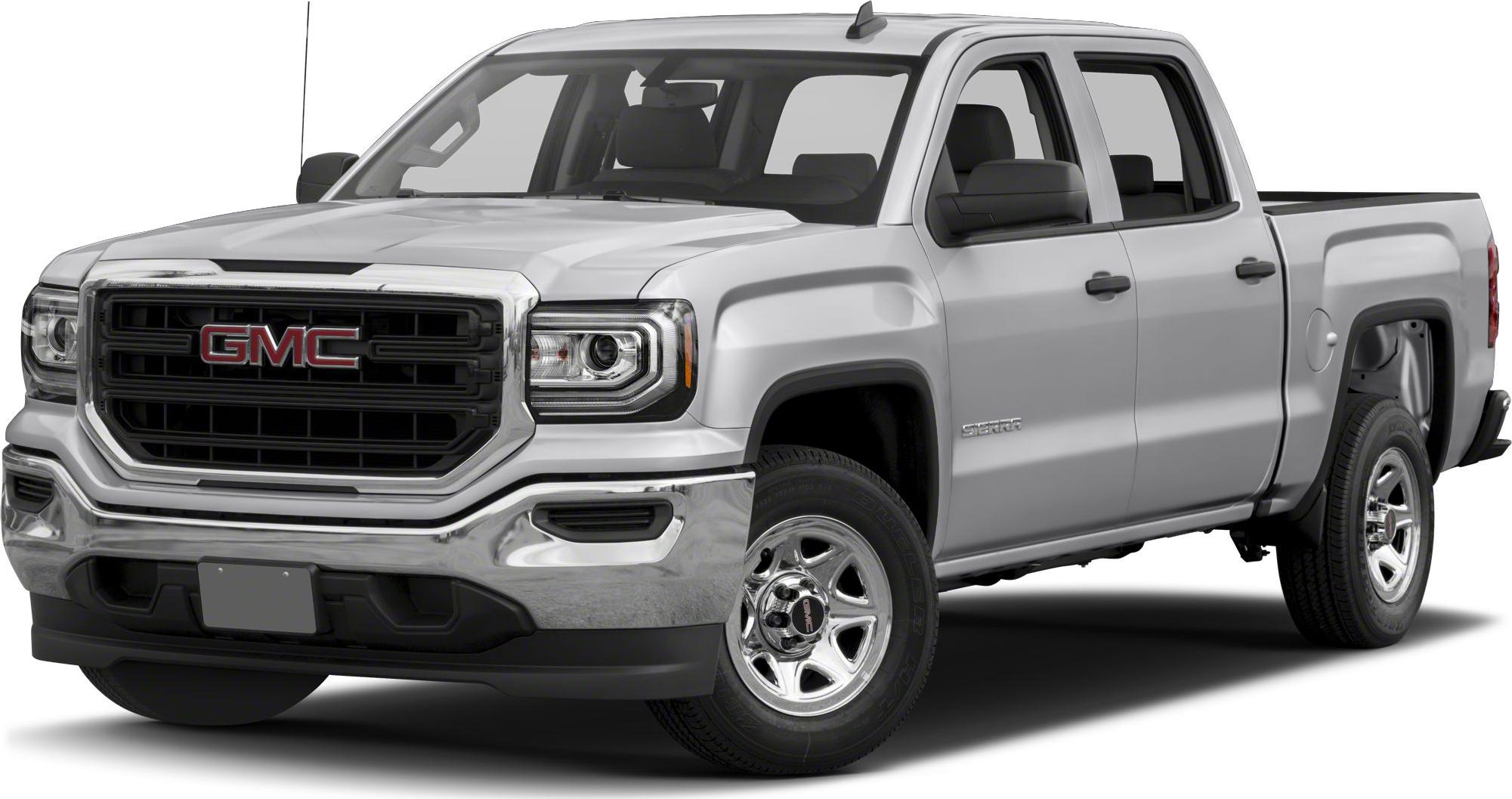 Front three-quarter view of a pickup with chrome grille and steel wheels