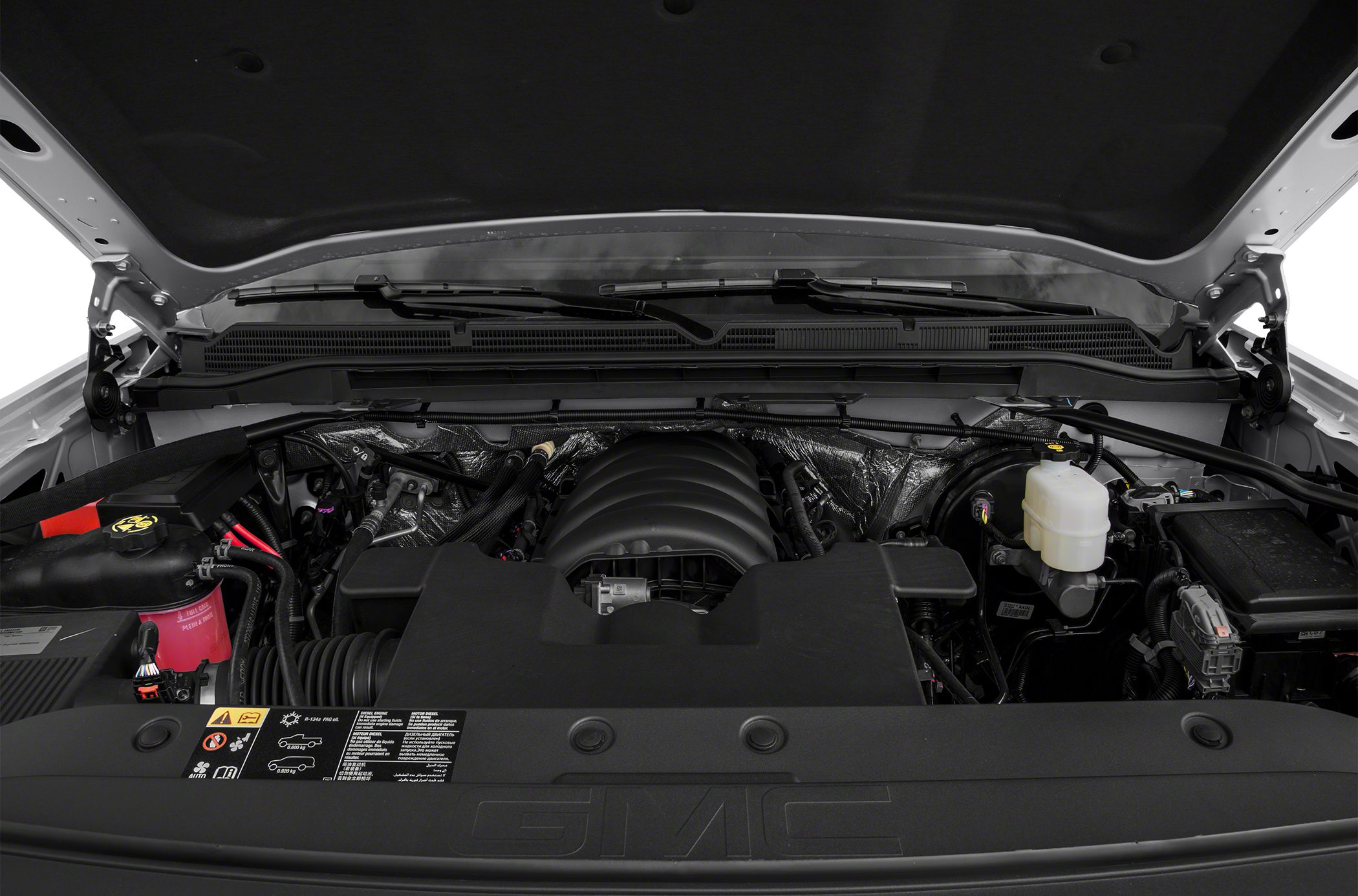 Engine compartment with detailed visible engine components under open hood