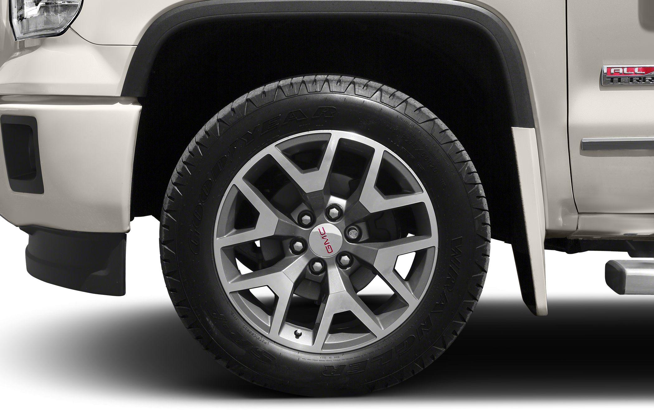 Alloy wheel and tire close-up with Goodyear branding