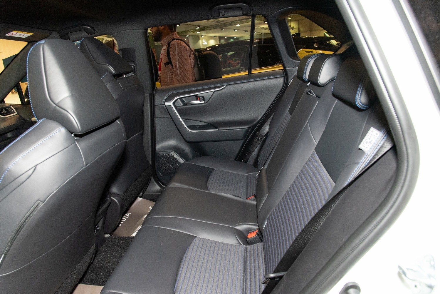 Rear seat with leather upholstery and modern door panel