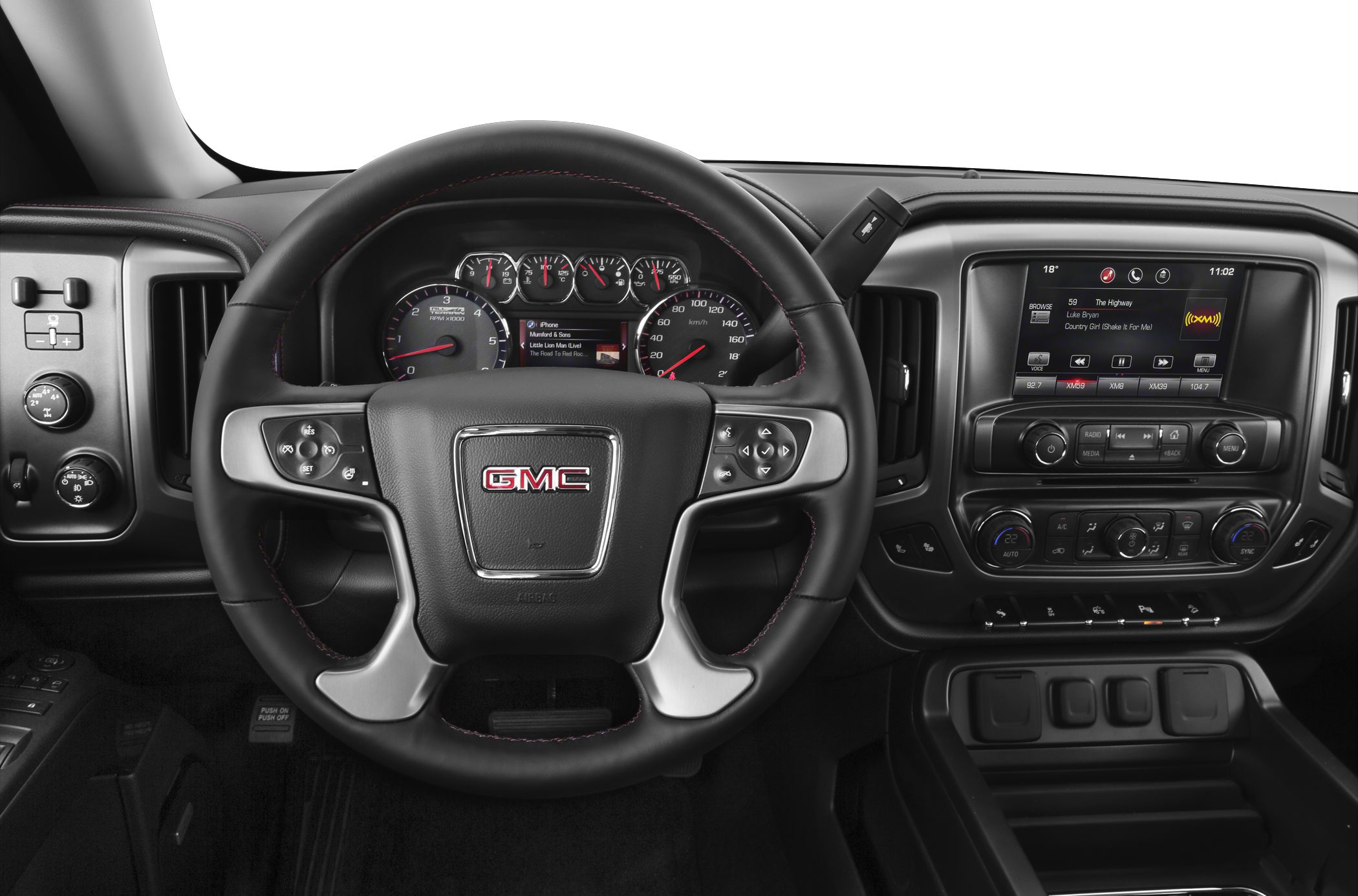 Steering wheel and dashboard with infotainment and climate controls