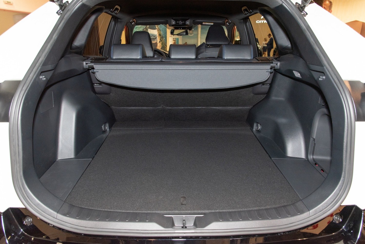 Rear cargo area with retractable cover in SUV