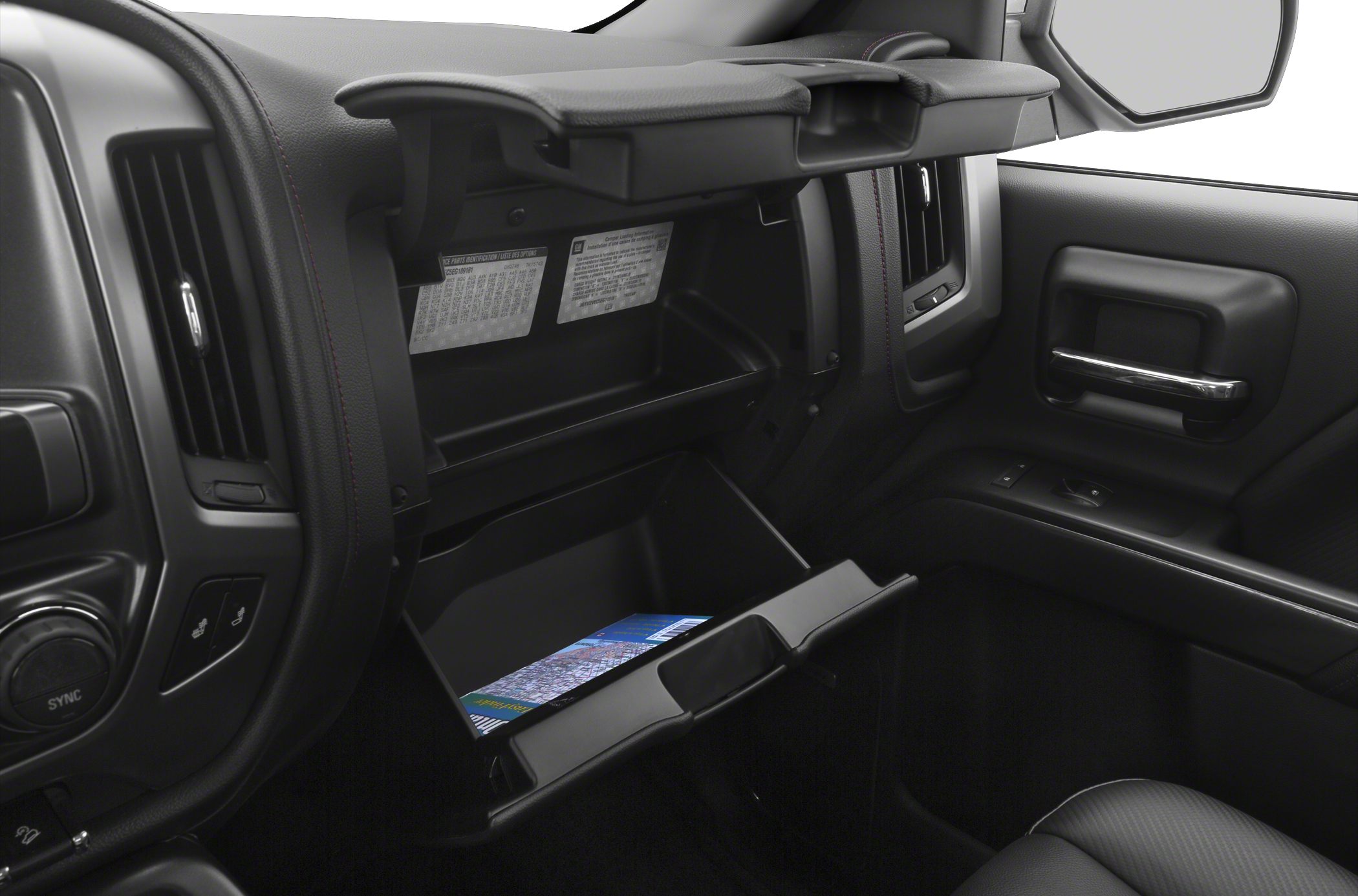 Opened dual-compartment glove box in vehicle interior