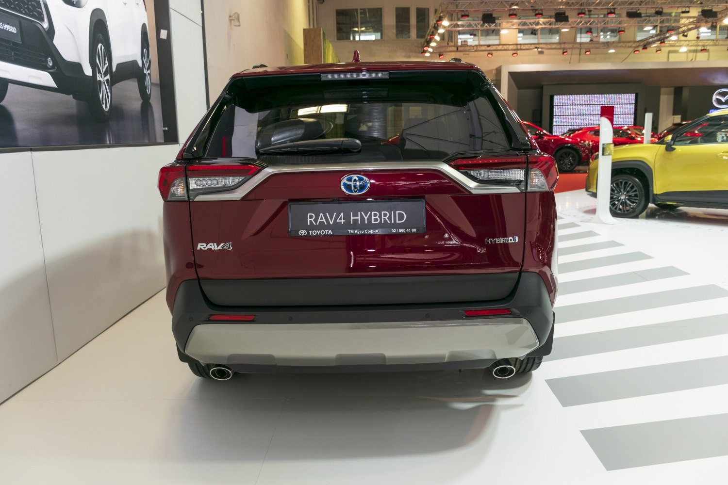 Rear view of 2019 hybrid SUV with distinctive taillights and dual exhausts