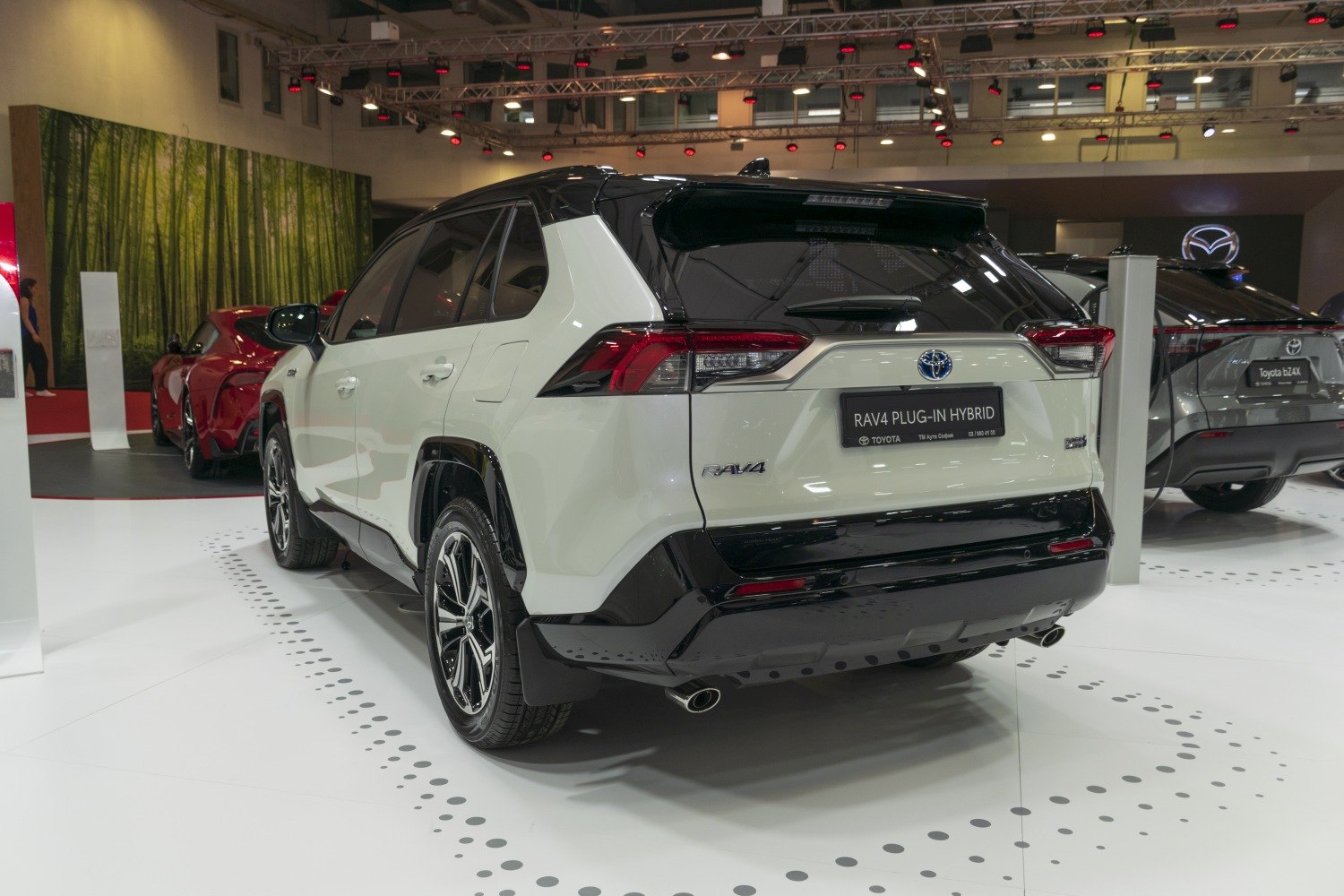 Rear view of plug-in hybrid SUV with sporty taillights and dual exhaust