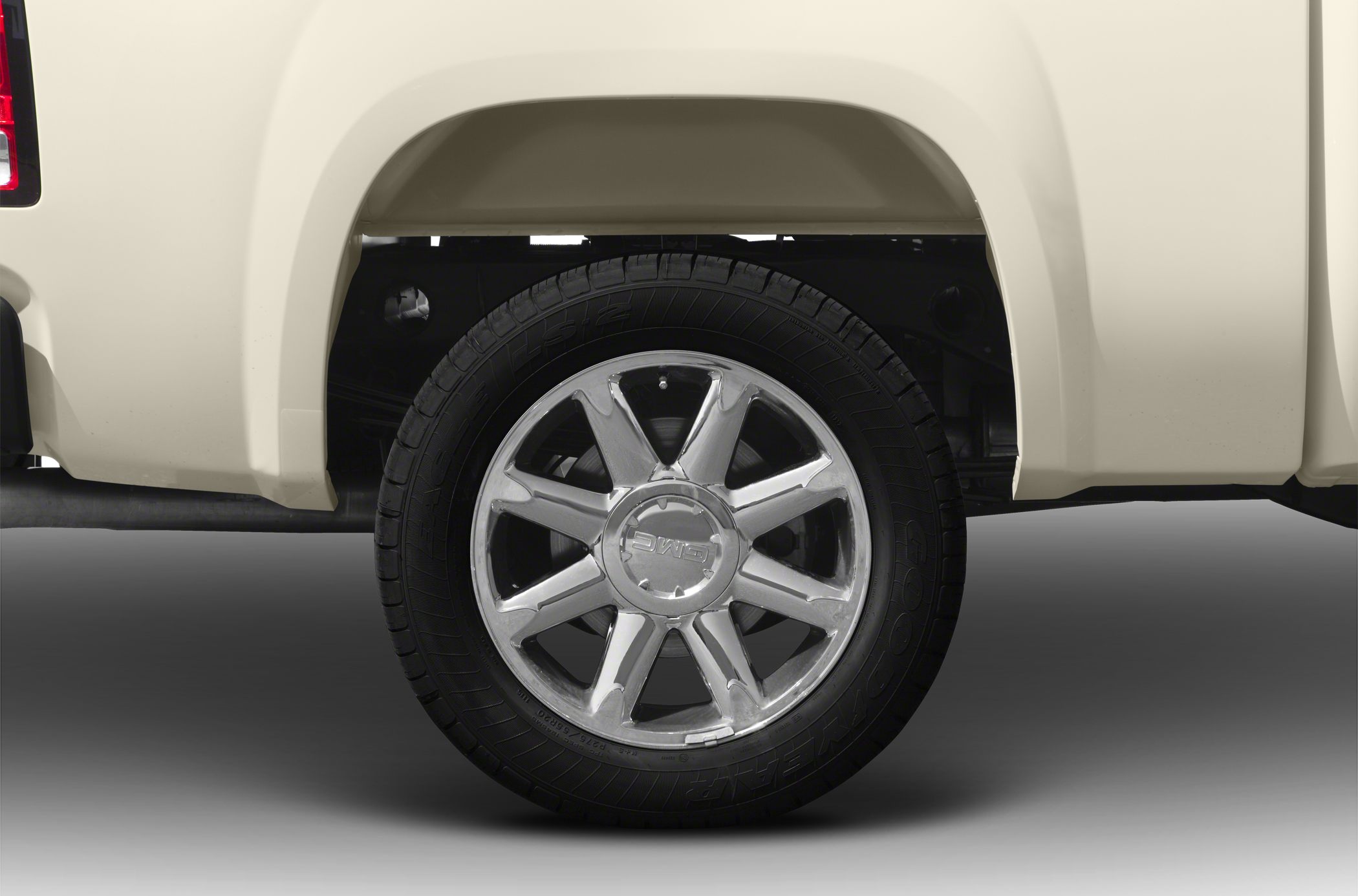 Rear wheel and tire close-up of a pickup truck