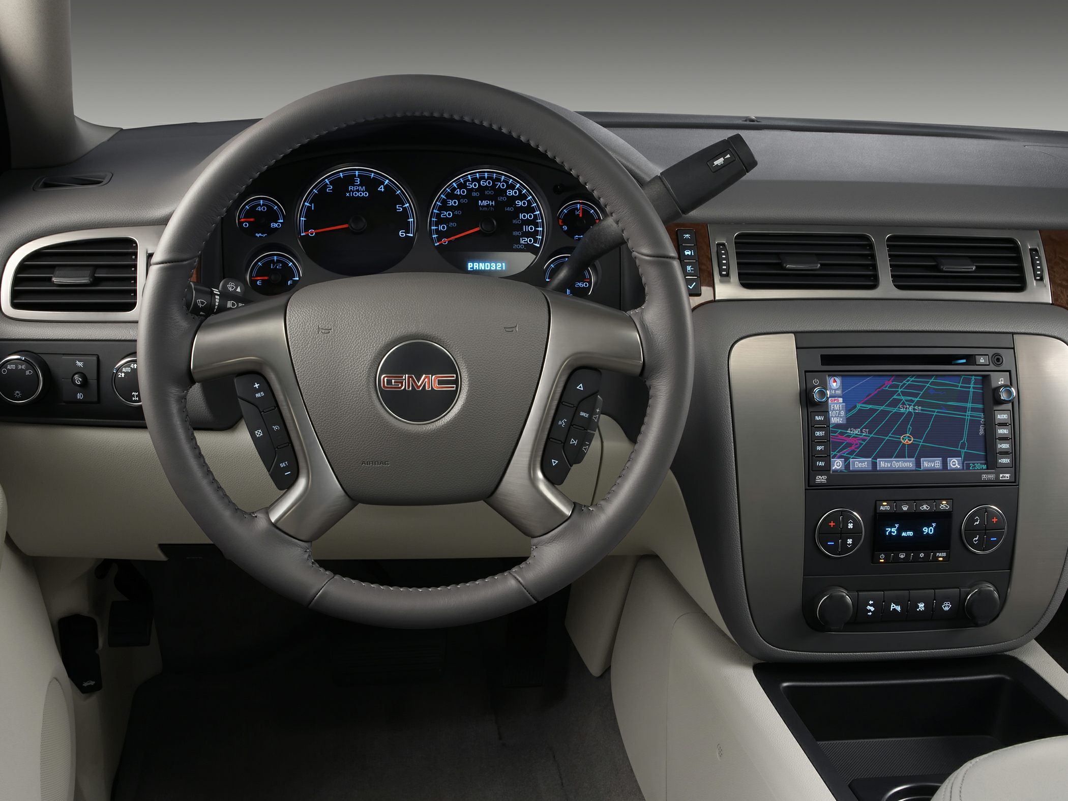 Steering wheel, dashboard with navigation and climate controls