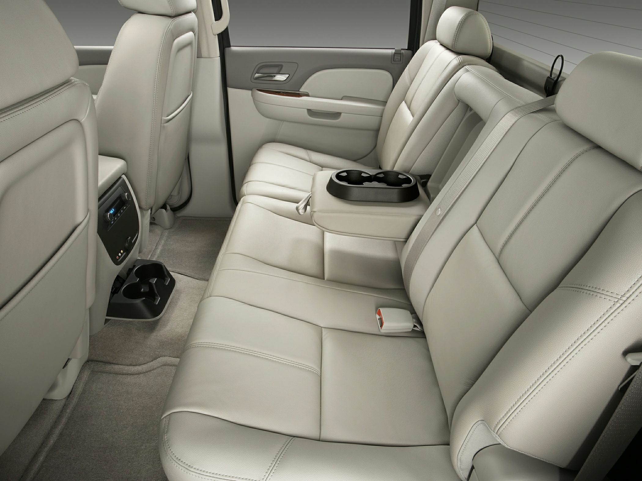 Rear leather seats and cup holders in truck interior
