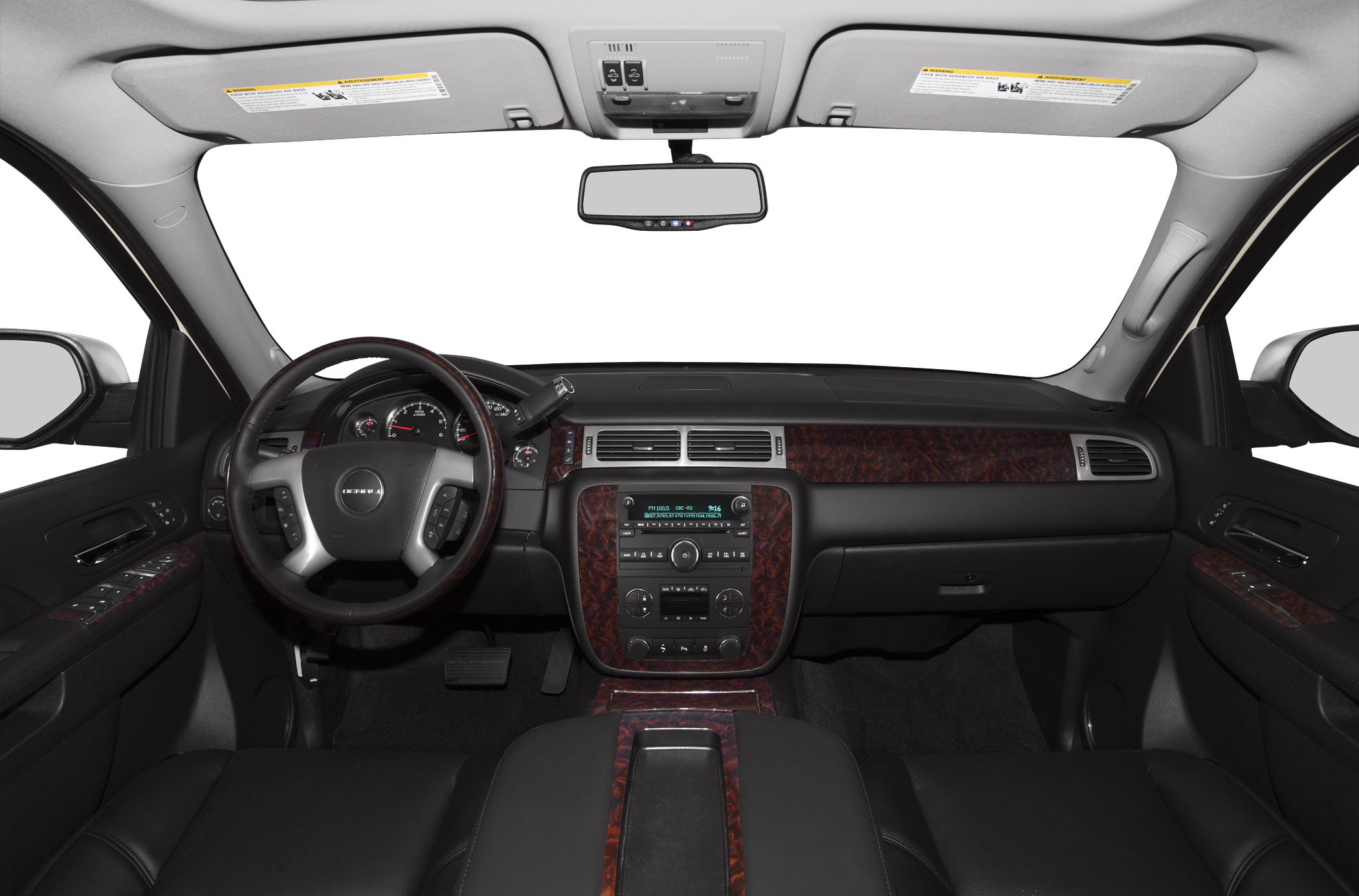 Dashboard and steering wheel with wood trim and multifunction controls