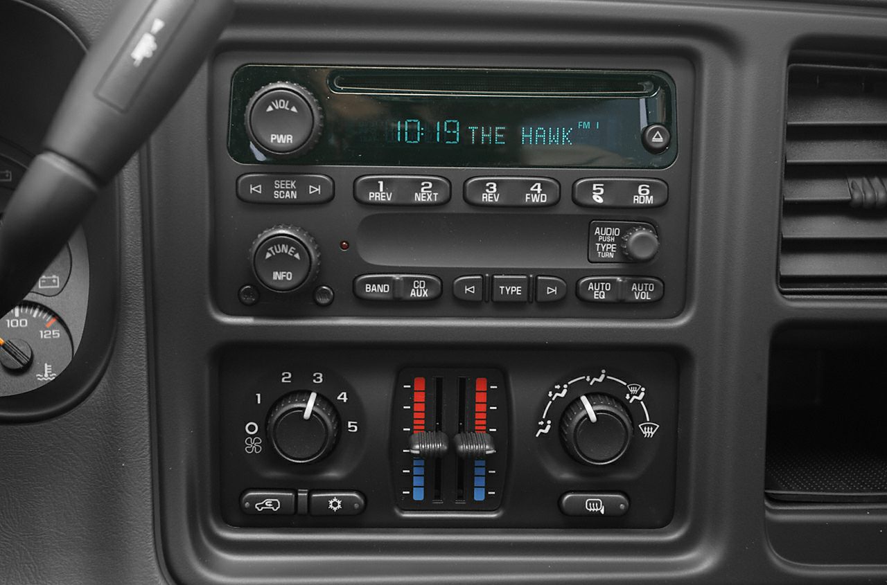 Vehicle radio and dual climate control sliders