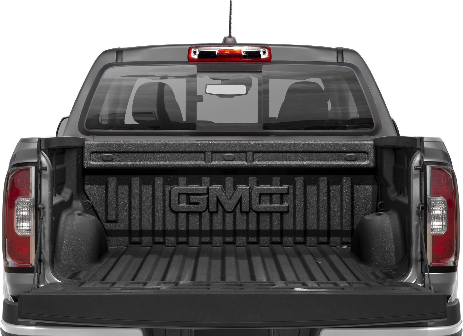 Open truck bed with textured liner and rear window