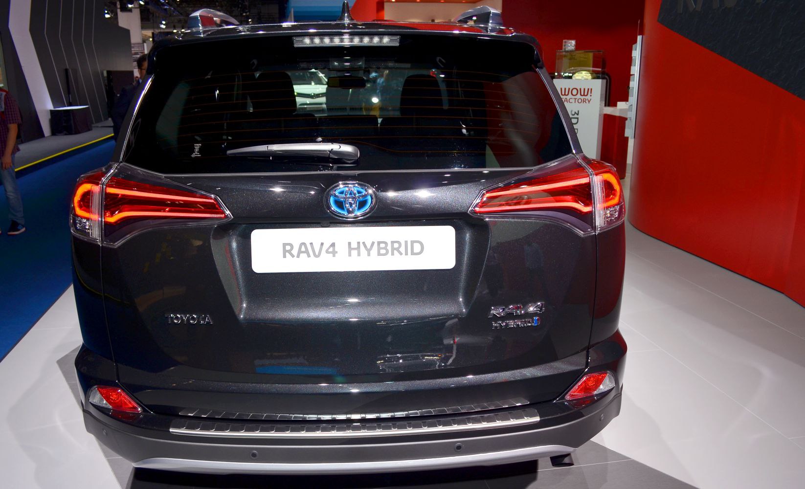 Rear view featuring LED tail lights and hybrid badge