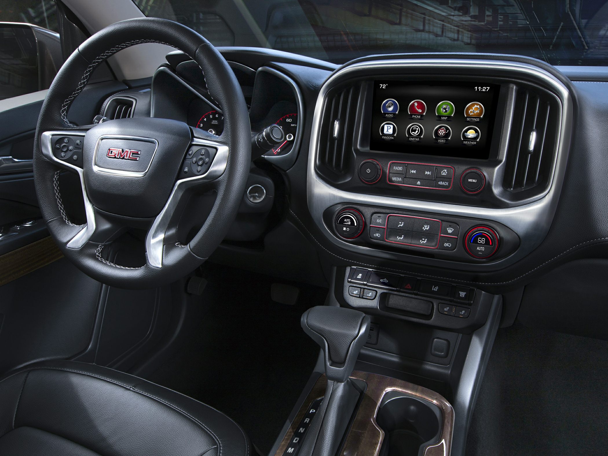 Dashboard and steering wheel with infotainment and climate controls