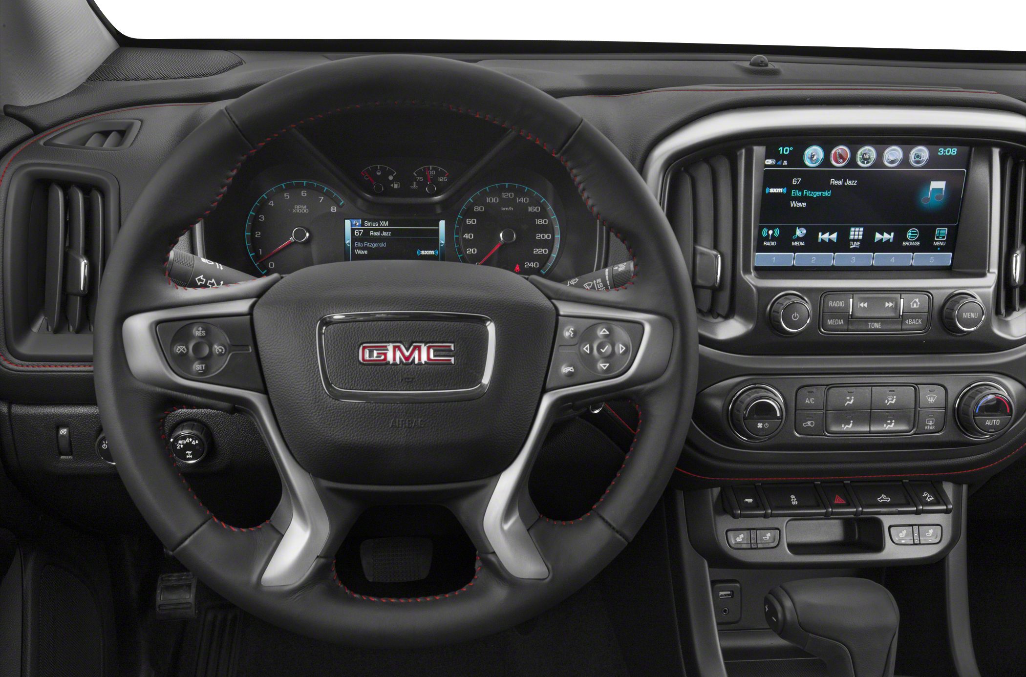 Steering wheel and dashboard with infotainment screen and controls