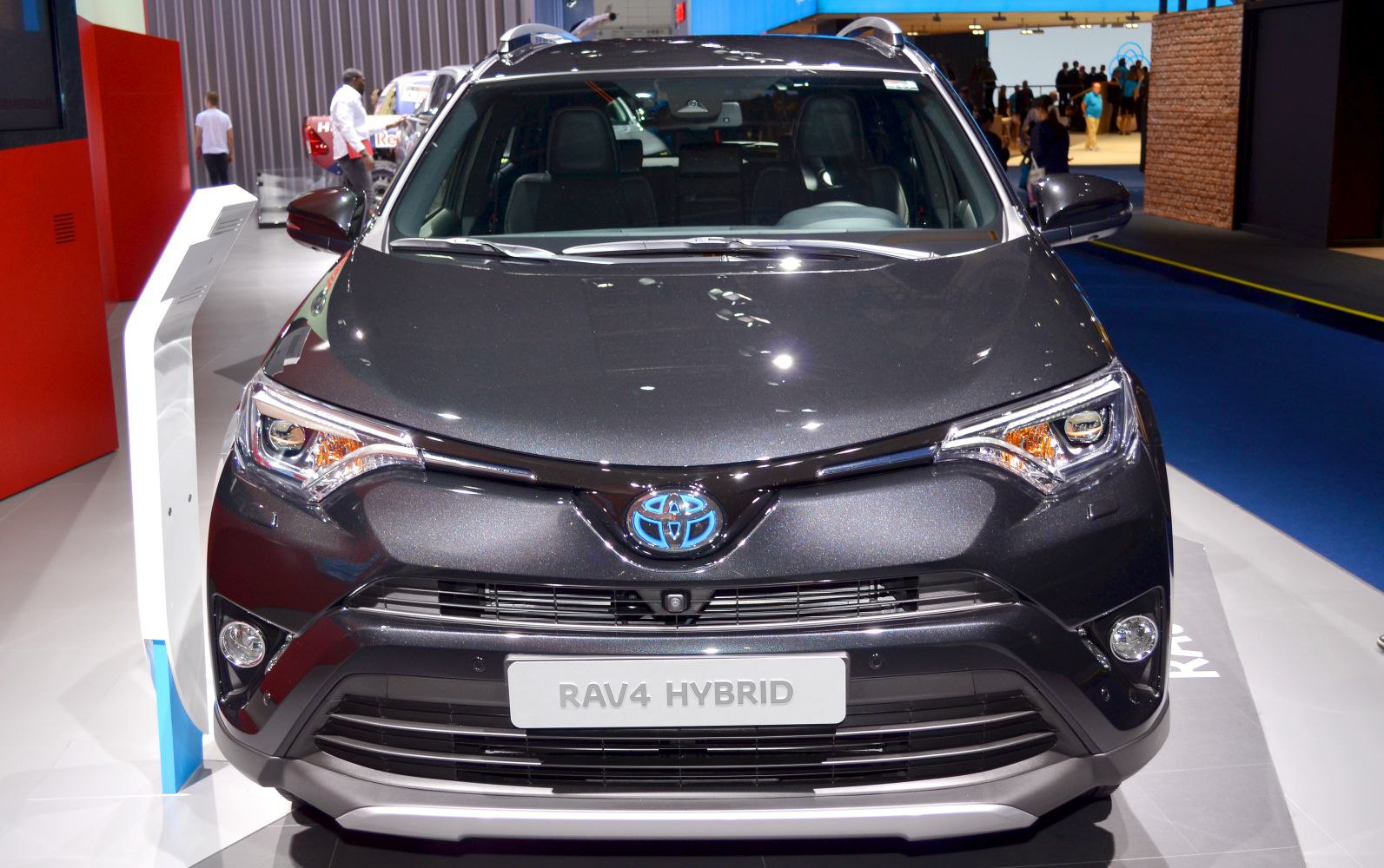 Front view of hybrid SUV with modern headlights and grille