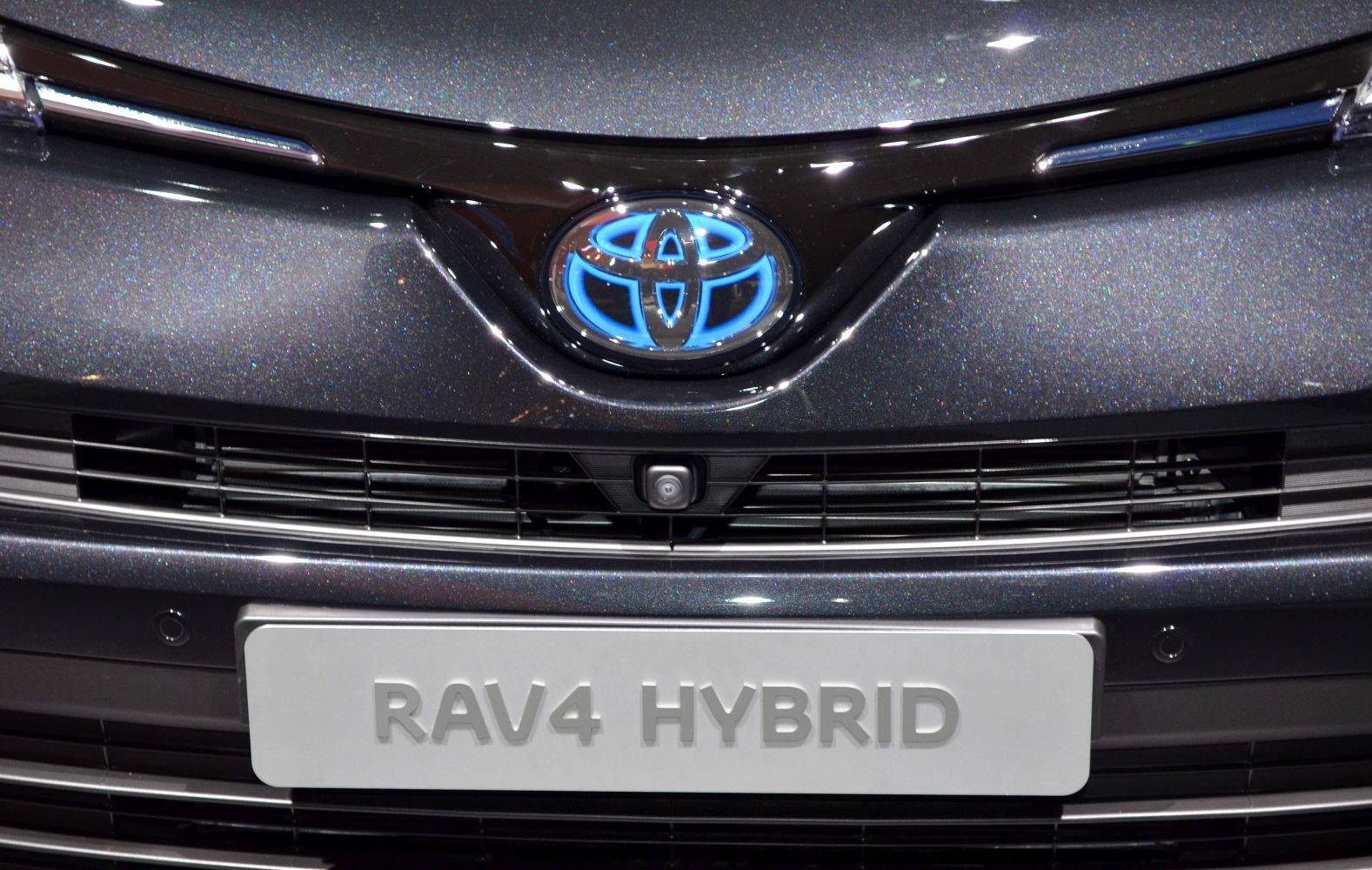 Front grille with illuminated Toyota emblem and hybrid badge