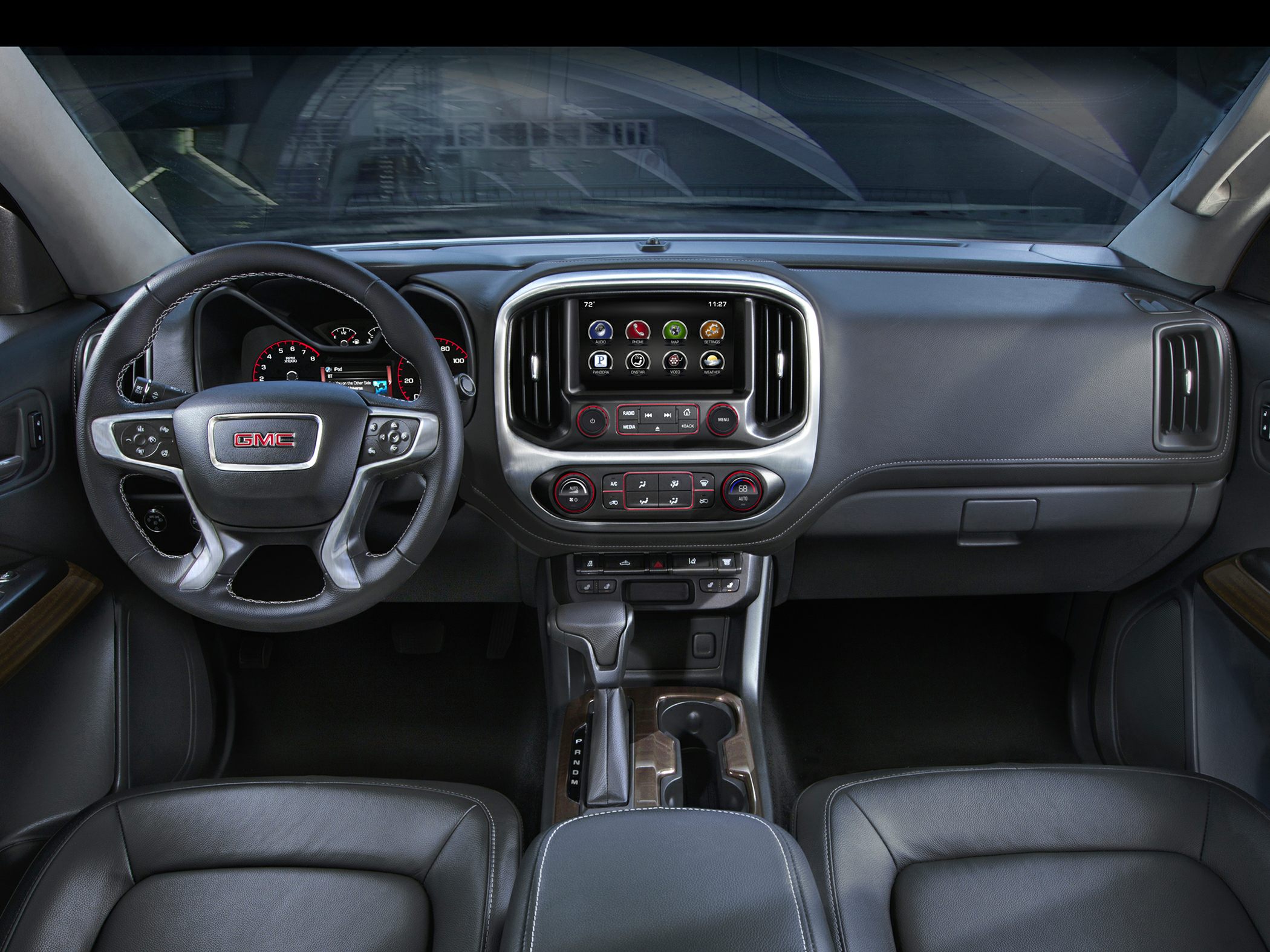 Dashboard, infotainment touchscreen, steering wheel, leather seats