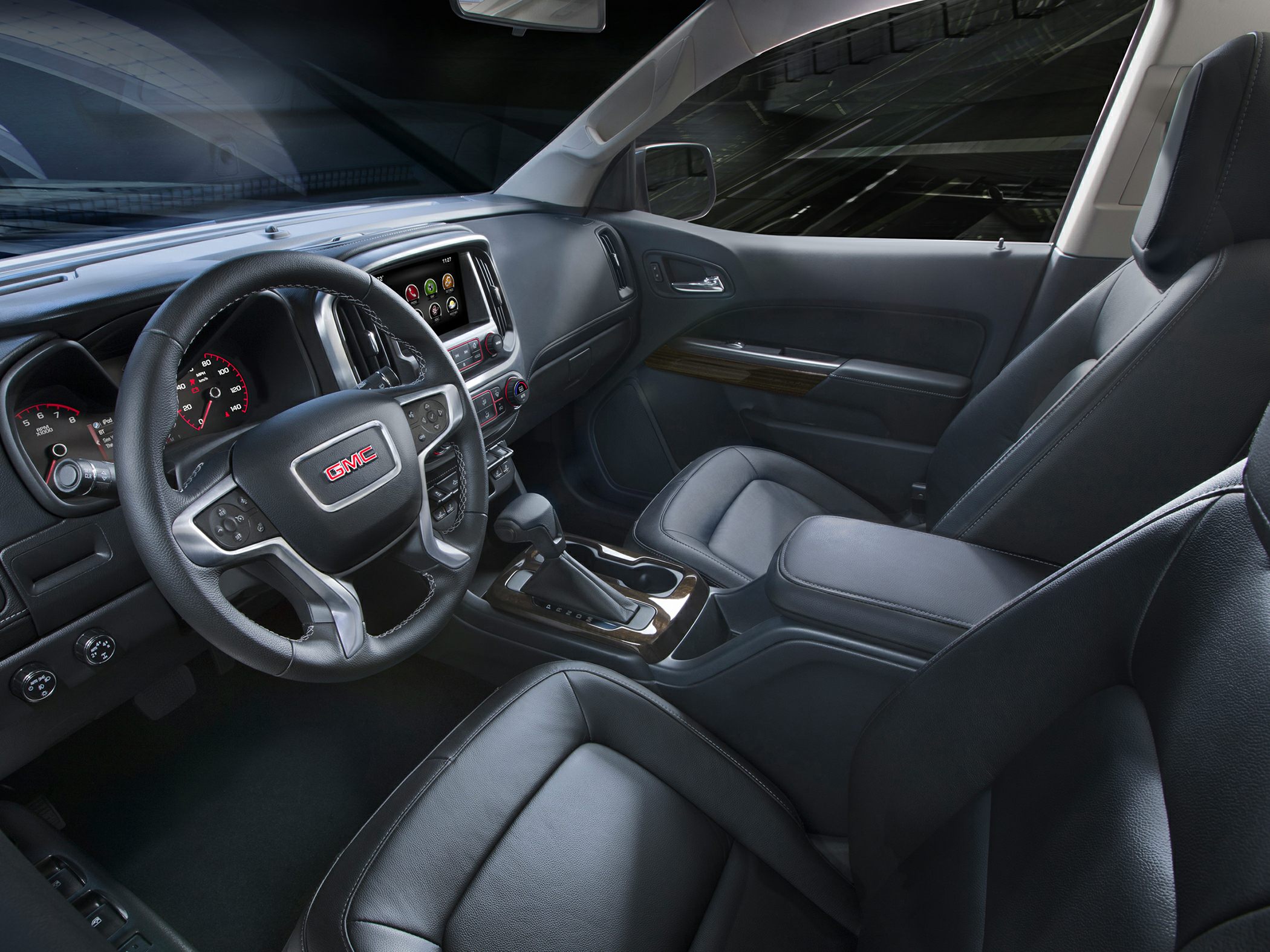 Leather seats and modern dashboard with touchscreen and steering wheel controls