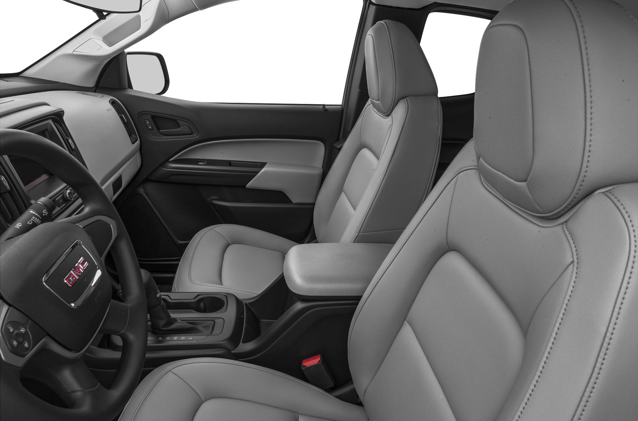 Interior cabin with leather seats and dashboard featuring steering wheel and gear shift