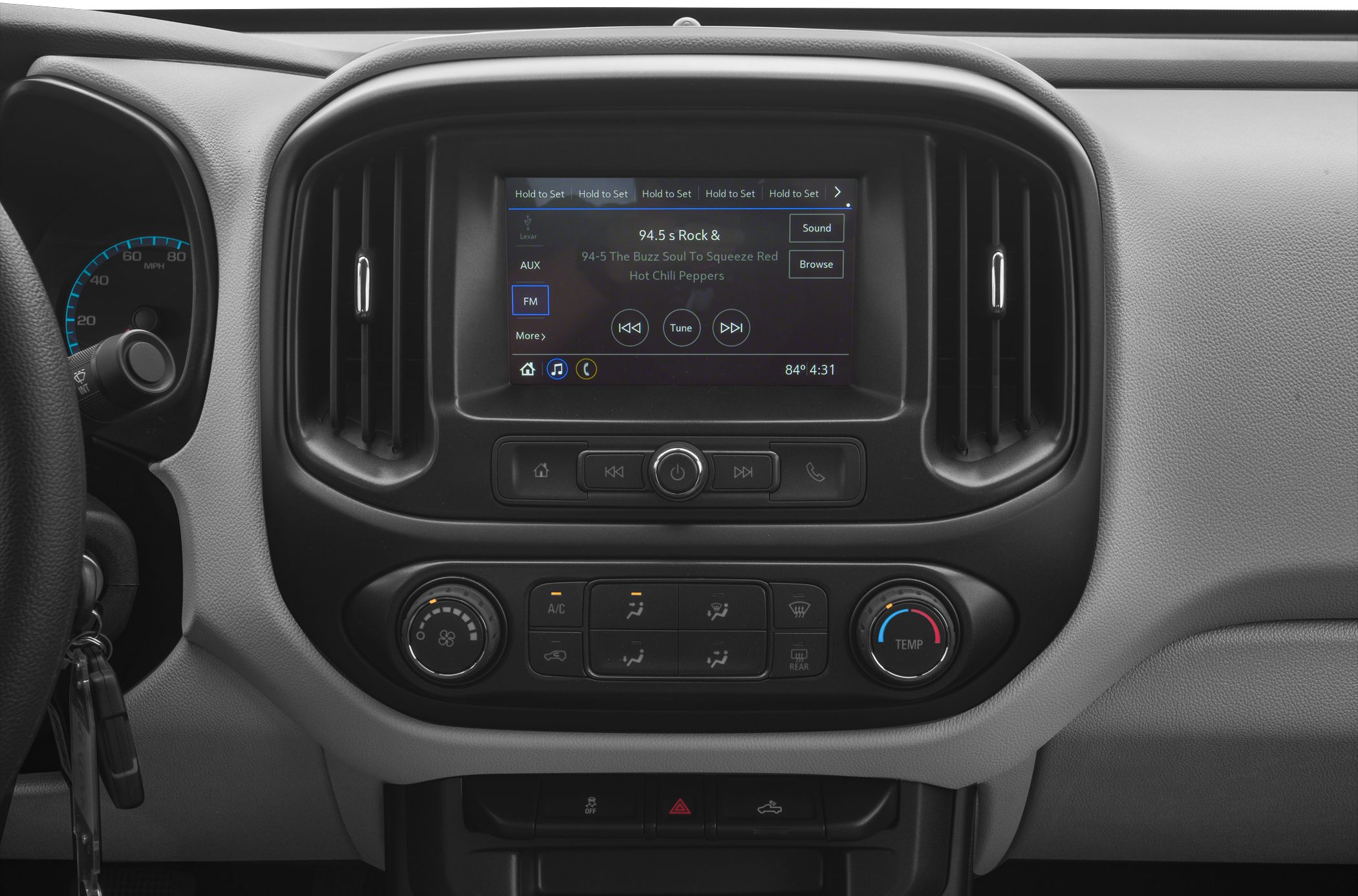 Infotainment screen with manual climate control knobs