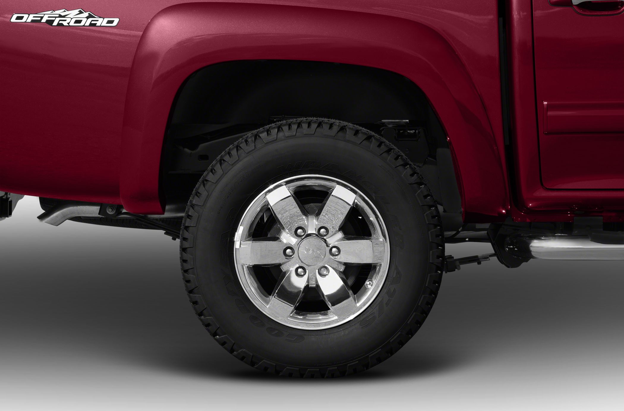 Off-road tire and chrome wheel on pickup truck