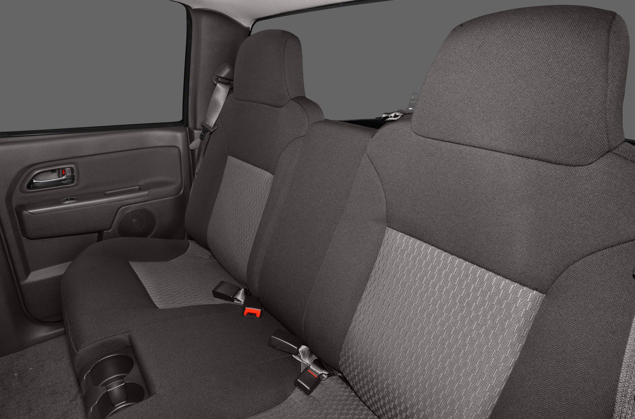 Fabric rear seats with seat belts and cup holders in crew cab interior
