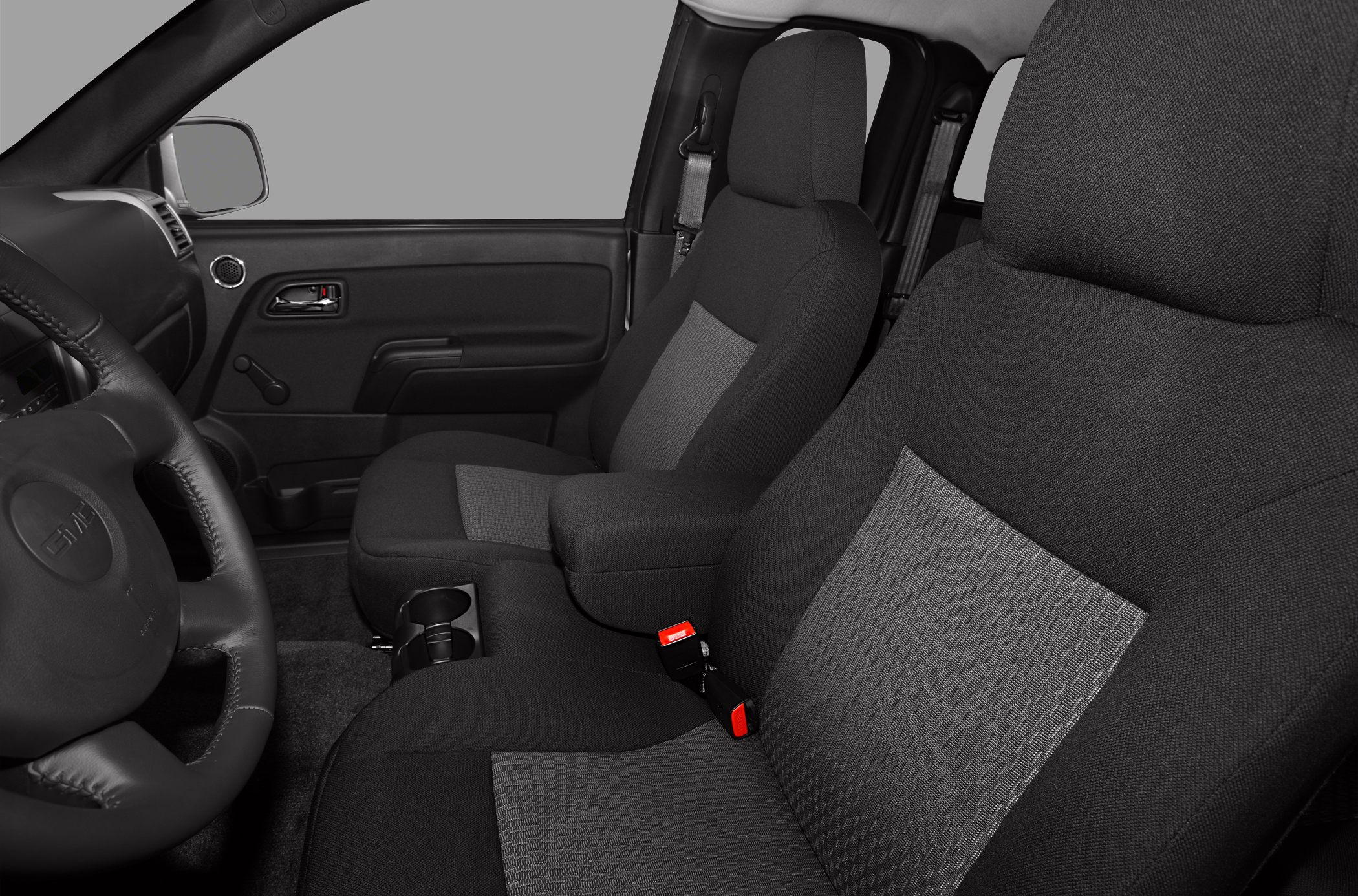 Close-up of fabric seats and door panel in extended cab interior