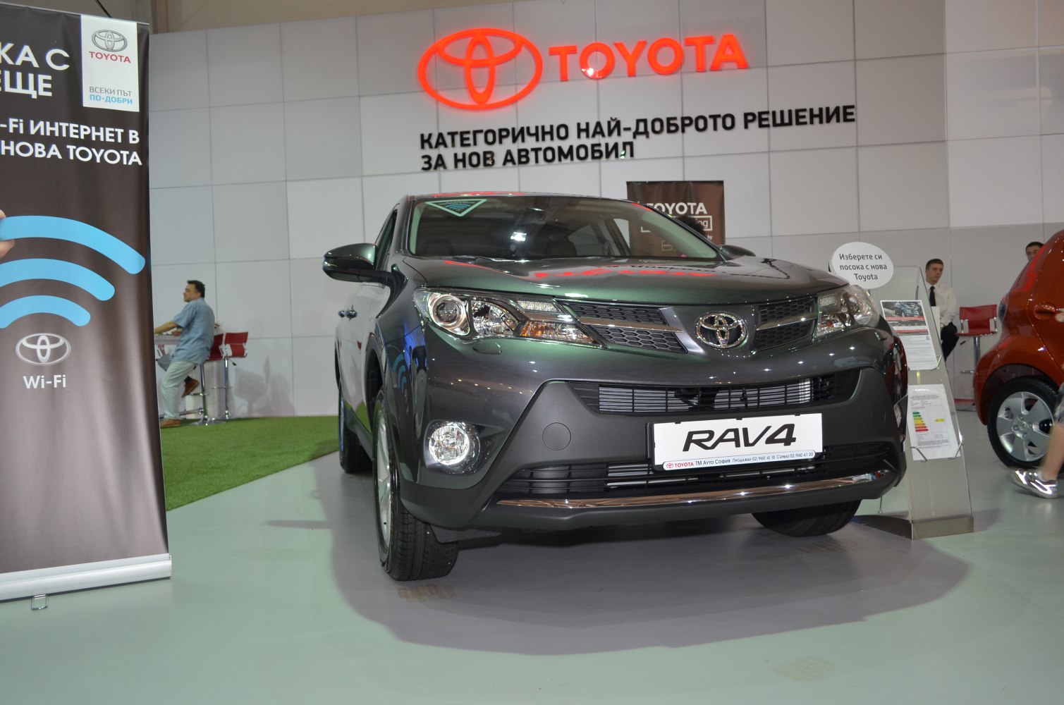Front view of SUV with grille and headlights