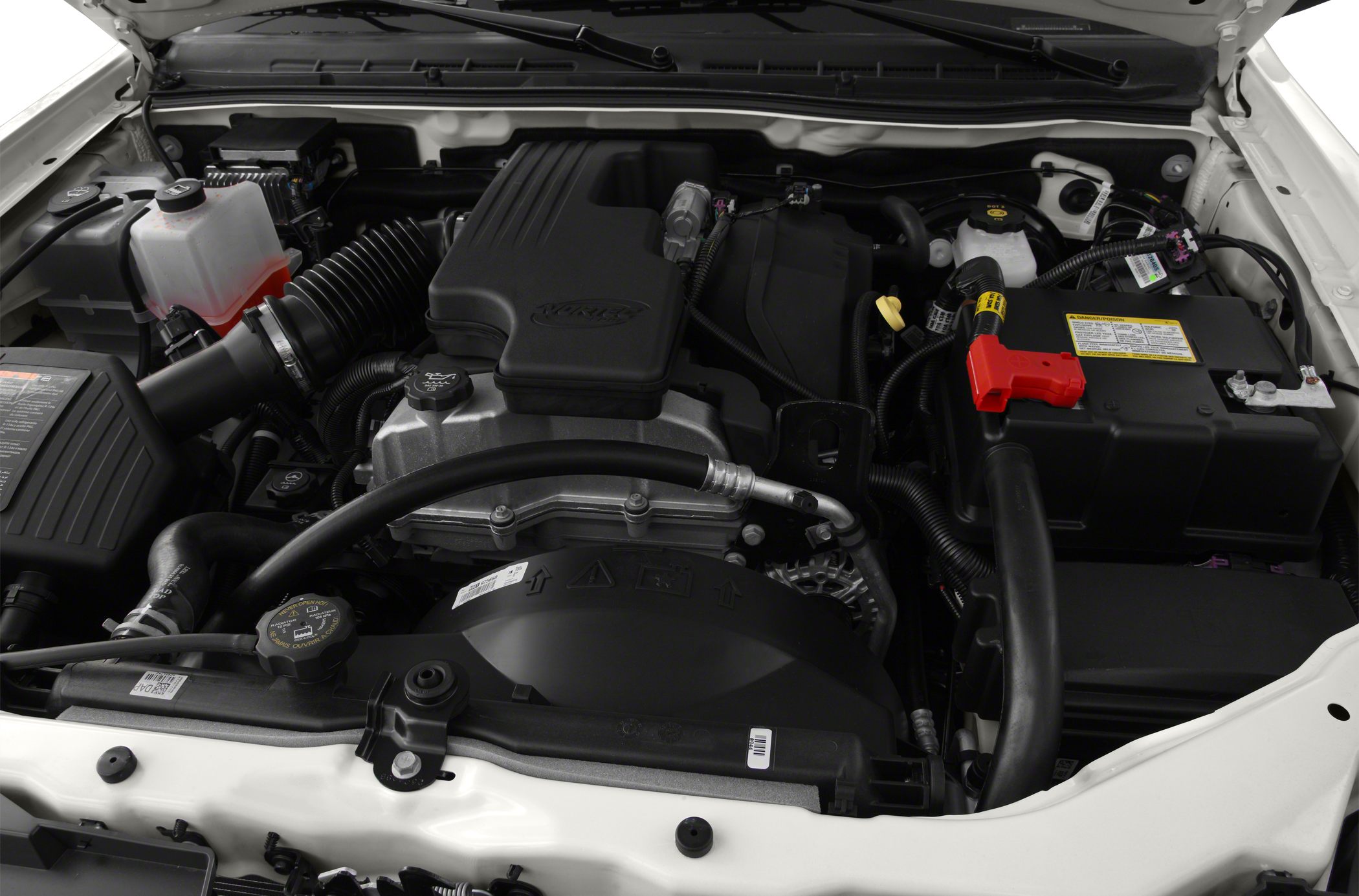 Detailed engine compartment with visible components and hoses