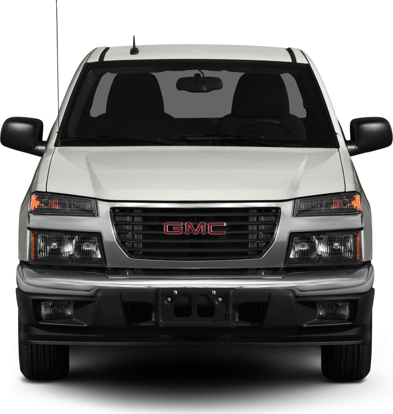 Front view featuring grille, headlights, bumper, and side mirrors