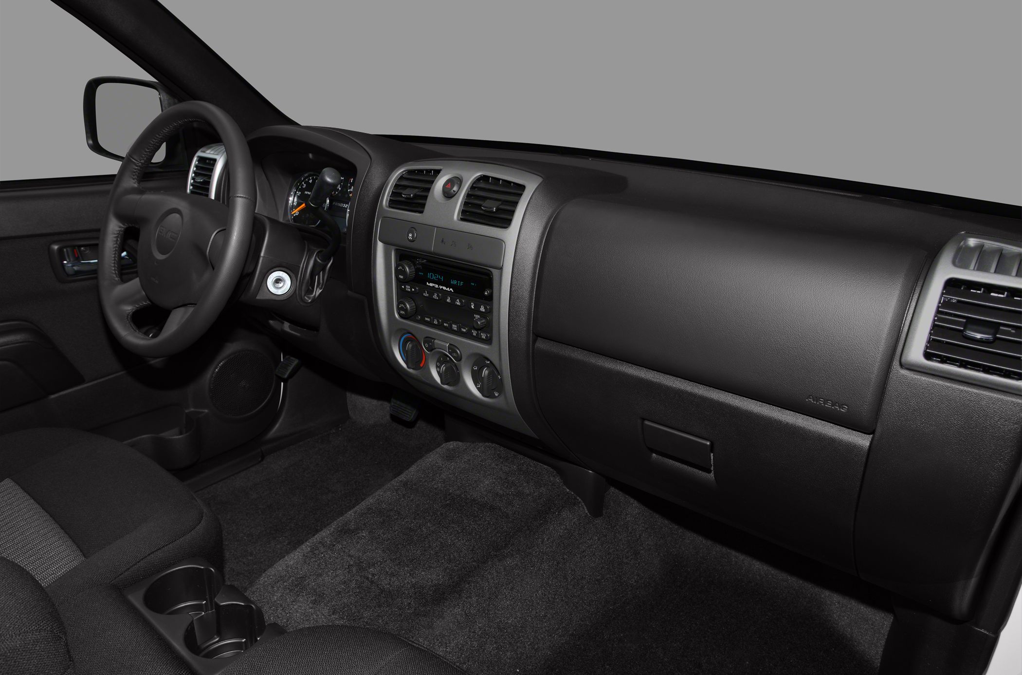 Dashboard and steering wheel with control panel
